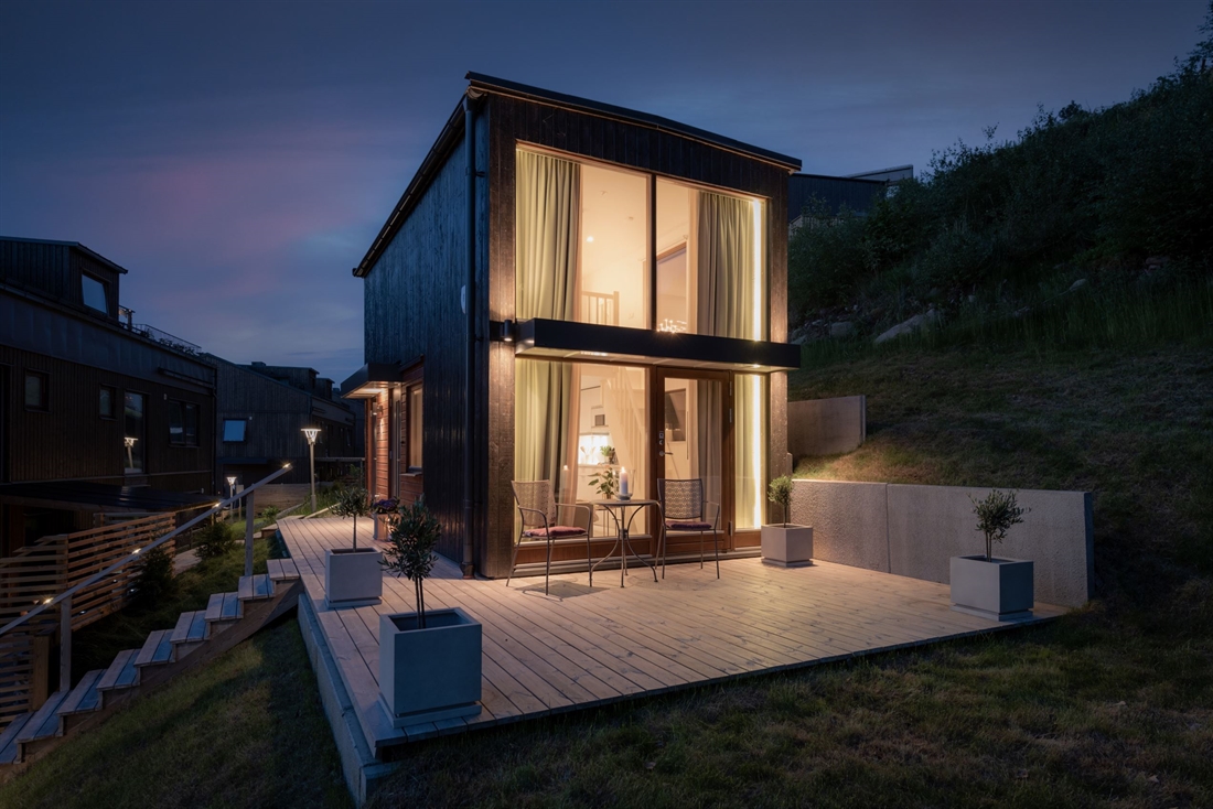 Fenêtres panoramiques pour une mini maison en bois de 34m2