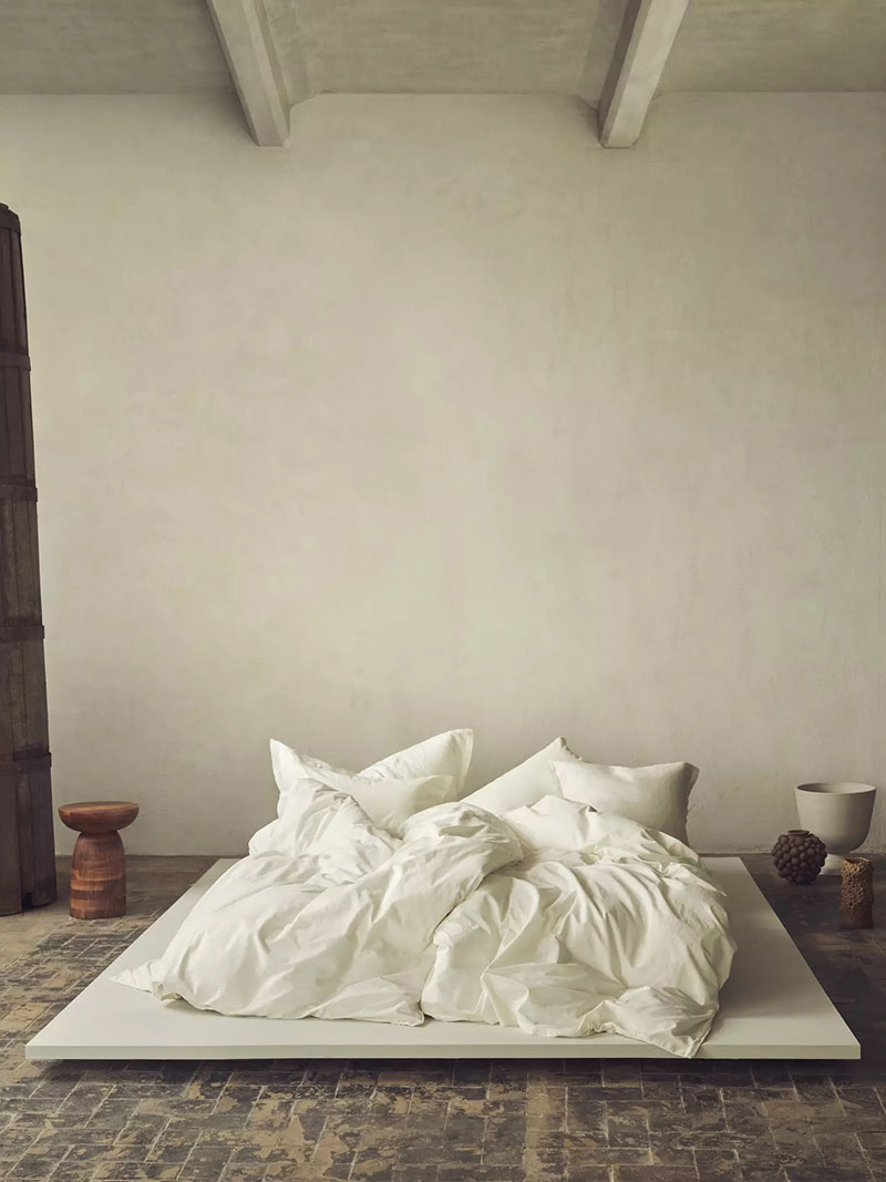 lit avec draps en lin