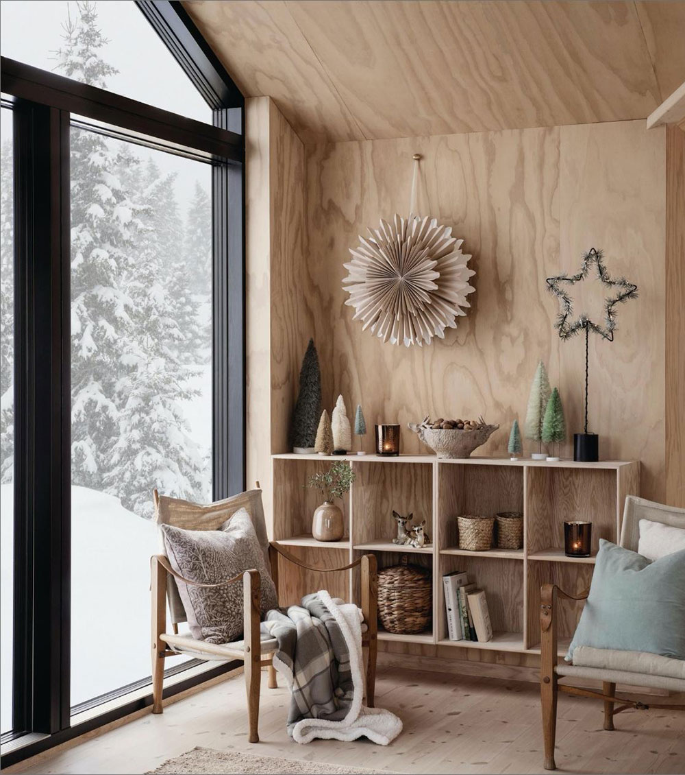salon maison en bois avec décoration de Noël