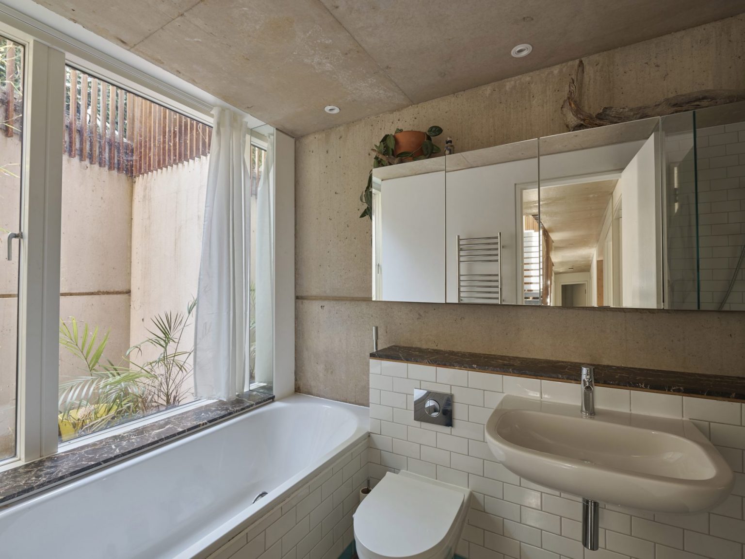 salle de bain béton maison contemporaine