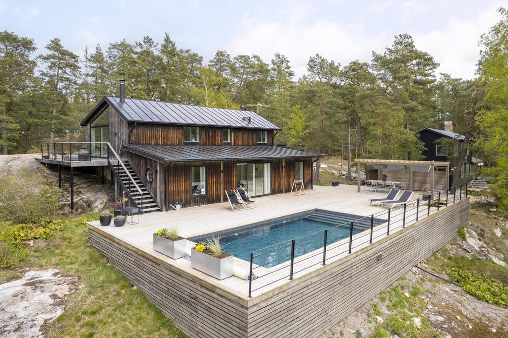 maison en bois avec piscine Suède