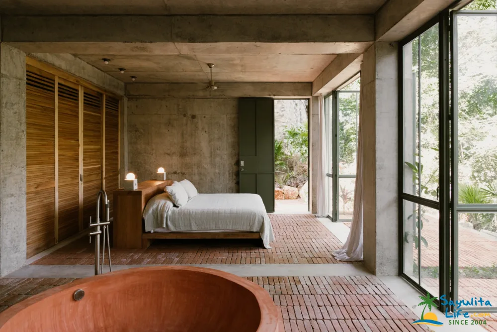 chambre avec baignoire ronde maison architecte béton