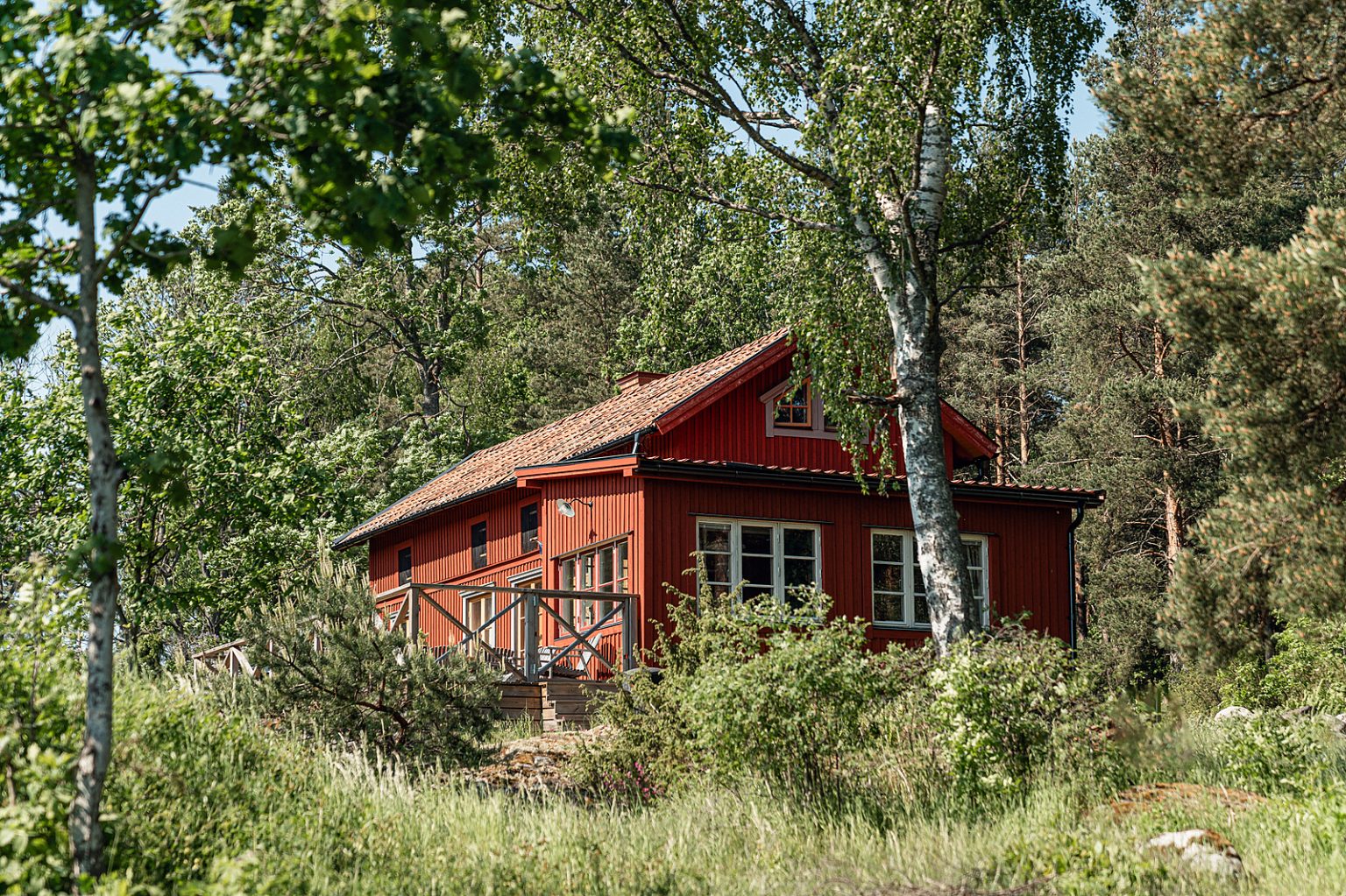 maison en bois rouge Suède