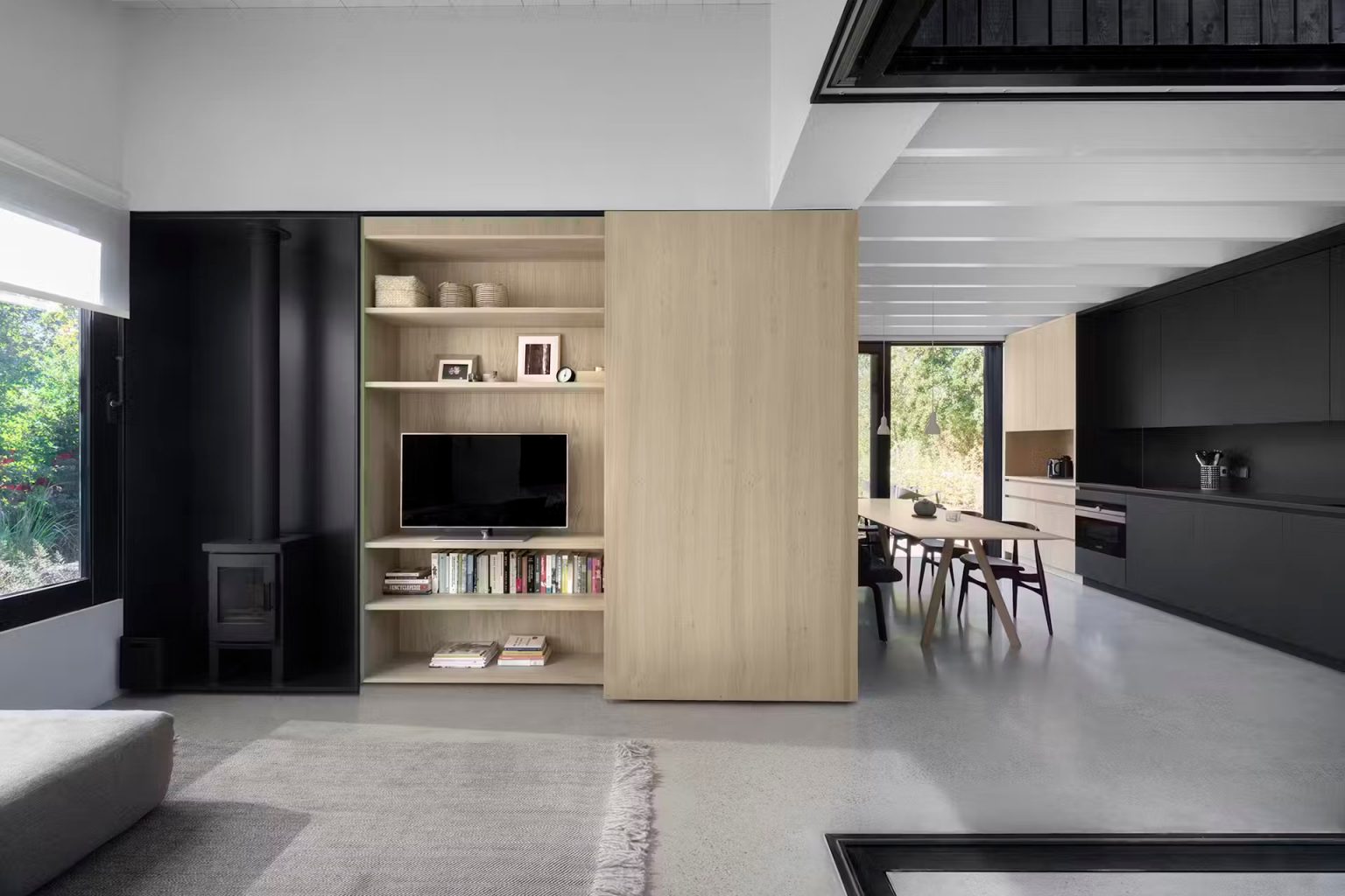 salon et cuisine petite maison Câpsula par i29 Architects