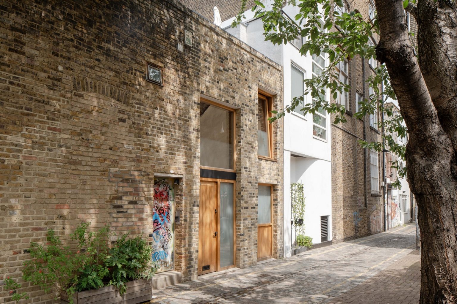 petite maison de ville accolée façade briques Londres