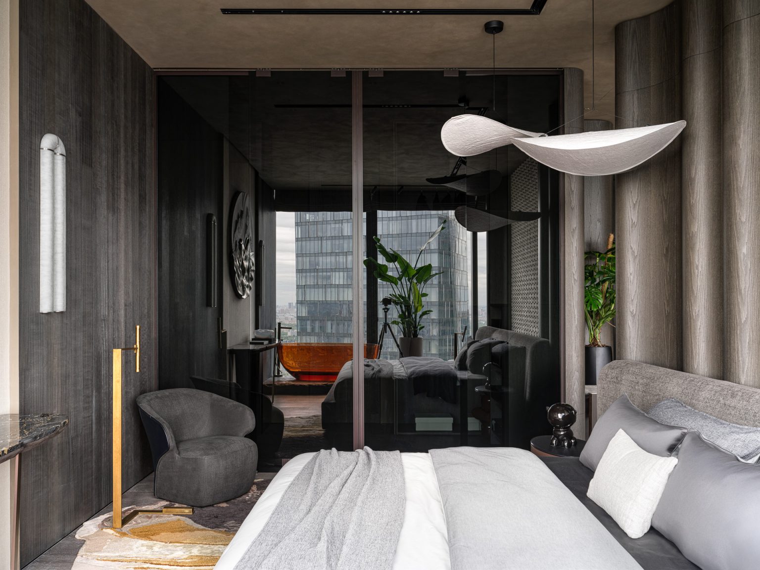 chambre contemporaine avec baignoire ambrée transparente orange et baies vitrées