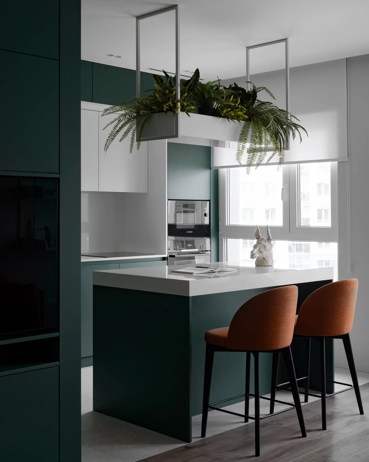 cuisine ouverte deux-pièces design 59m2 décoration verte et orange