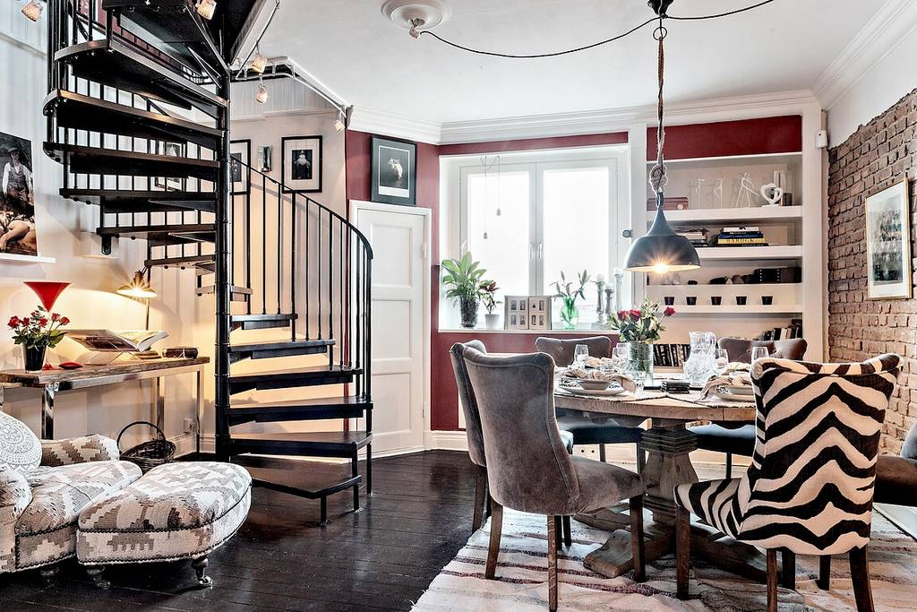 salle à manger avec escalier en colimaçon appartement en triplex décoration scandinave et classique chic salle à manger avec escalier en colimaçon appartement en triplex décoration scandinave et classique chic