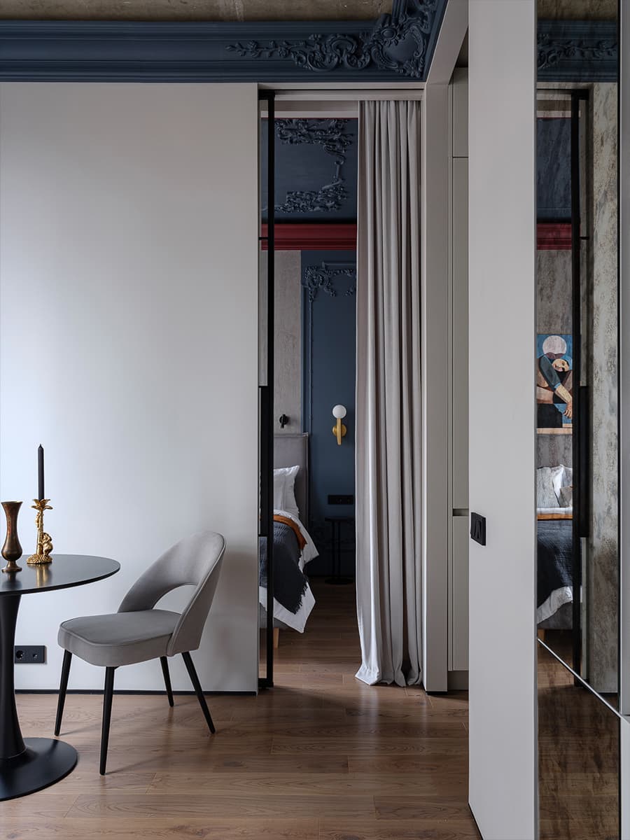 chambre porte verrière et espace salle à manger design avec table pied tulipe deux-pièces de 41m2 décoration contemporaine chambre porte verrière et espace salle à manger design avec table pied tulipe deux-pièces de 41m2 décoration contemporaine