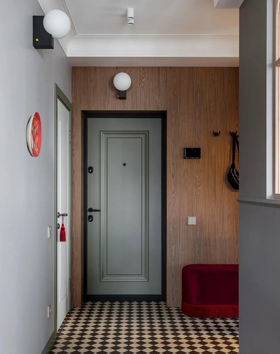 entrée carrelage à damier noir et blanc appartement décoration vintage