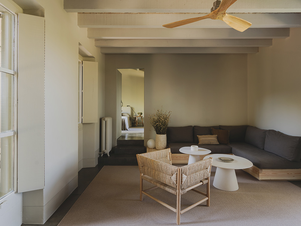living room with beams rustic chic decor Mediterranean eco-friendly house Spain