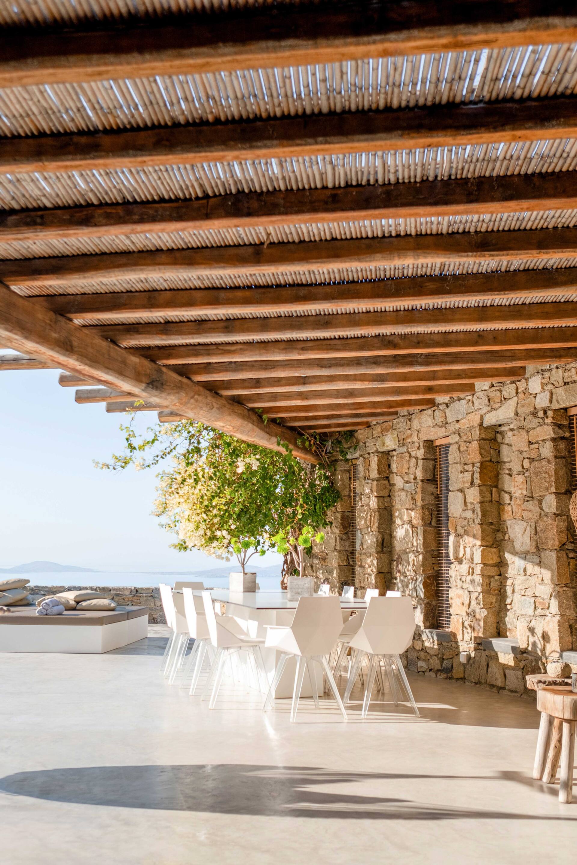 terrace with wooden pergola Mykonos house with swimming pool contemporary decor terrace with wooden pergola Mykonos house with swimming pool contemporary decor