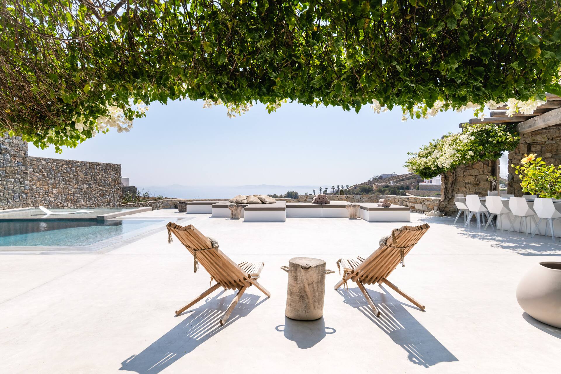 terrace with pergola Mykonos house with swimming pool contemporary decor terrace with pergola Mykonos house with swimming pool contemporary decor