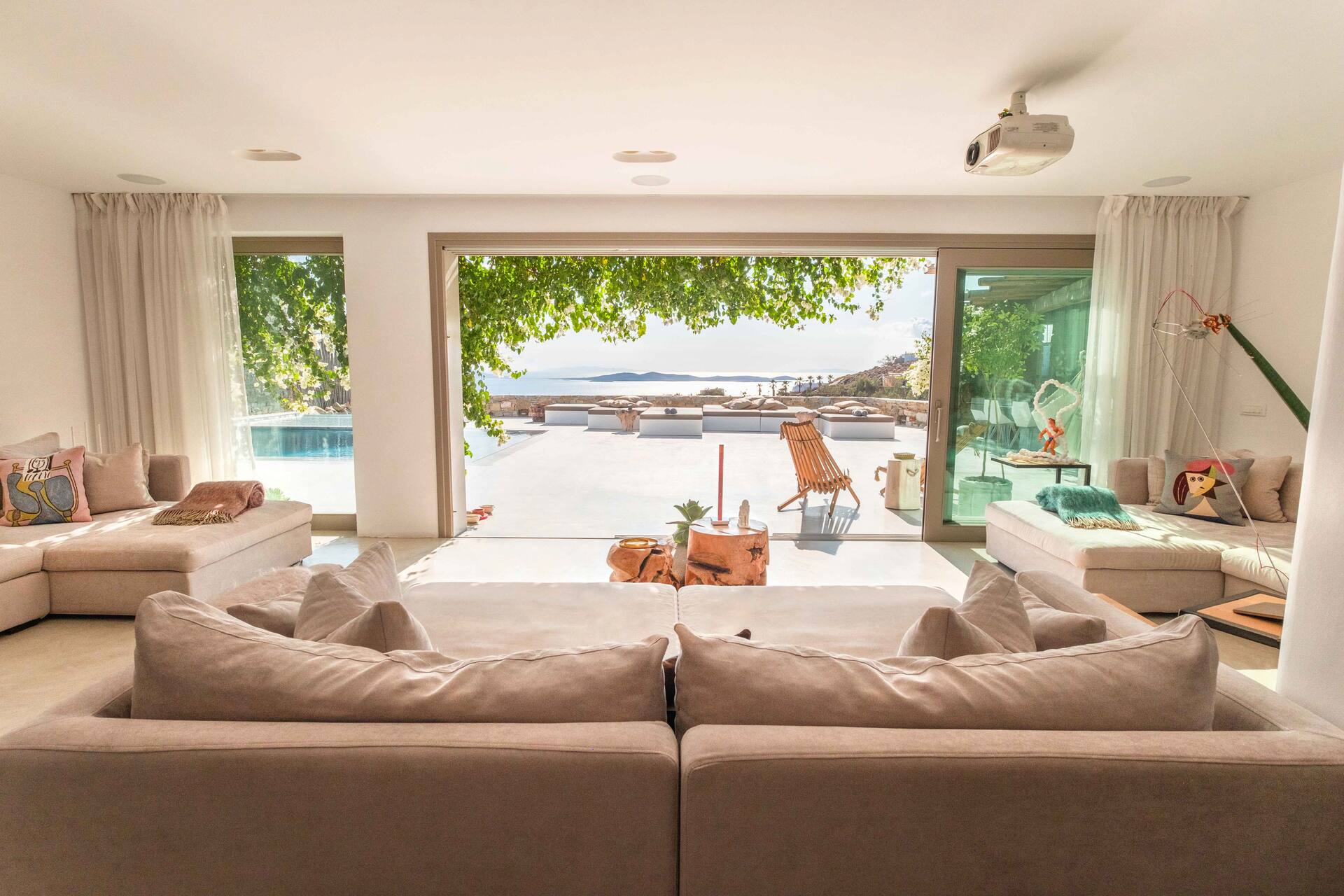 living room sea view Mykonos house with swimming pool contemporary decor living room sea view Mykonos house with swimming pool contemporary decor
