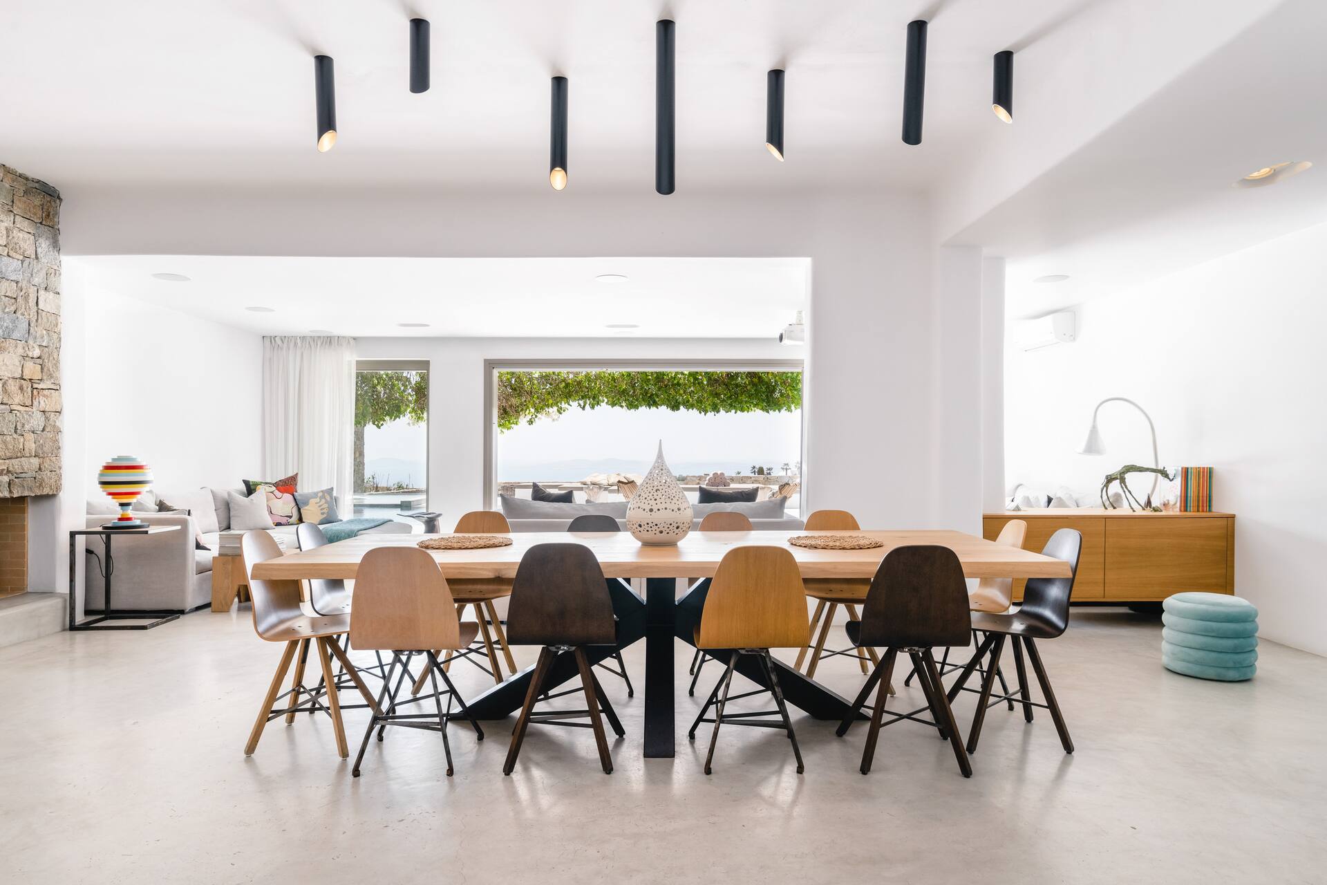 dining room and living room Mykonos house with swimming pool contemporary decor dining room and living room Mykonos house with swimming pool contemporary decor