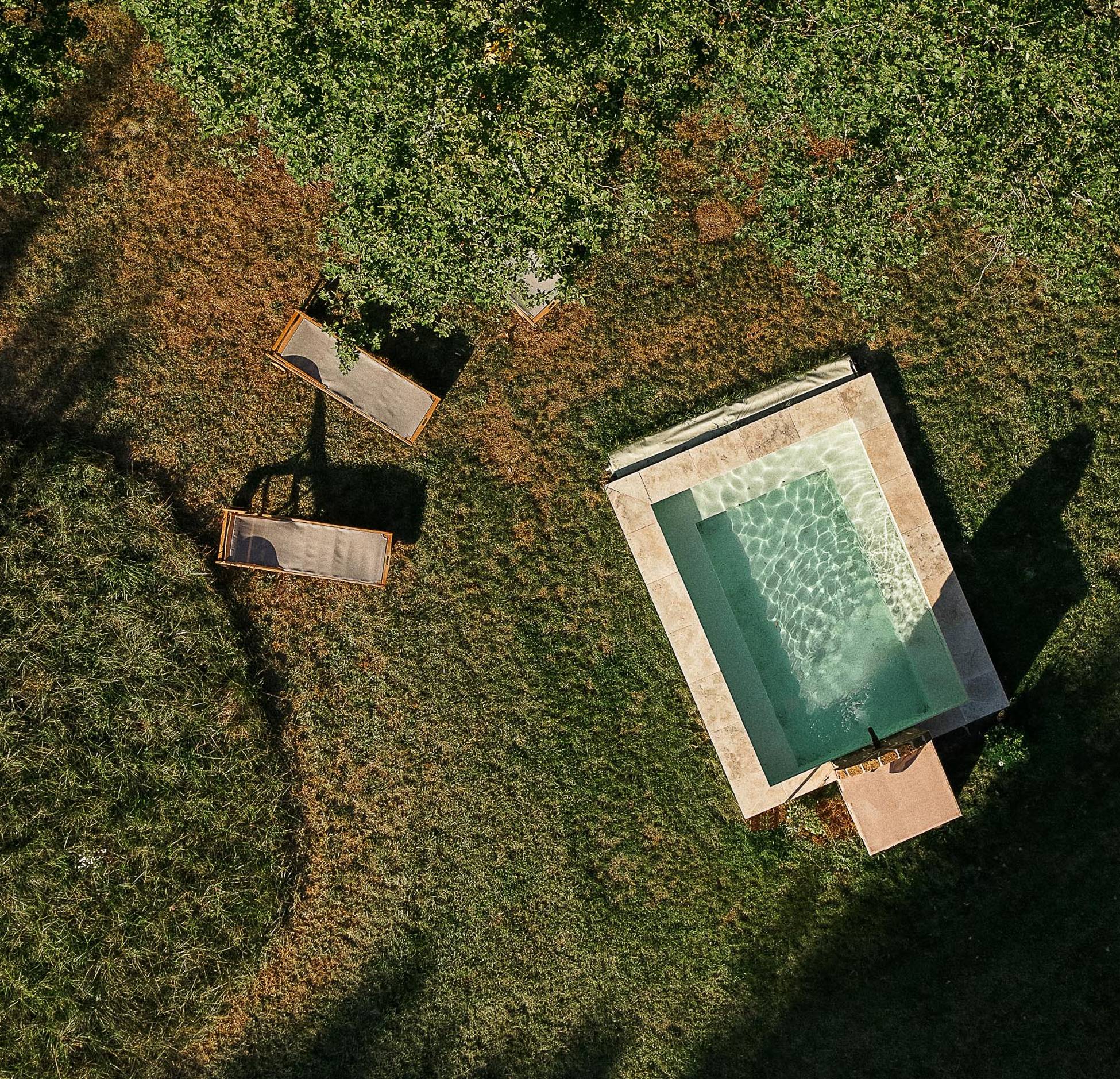 garden with swimming pool period stone house Hameau de Sol Sologne French countryside garden with swimming pool period stone house Hameau de Sol Sologne French countryside