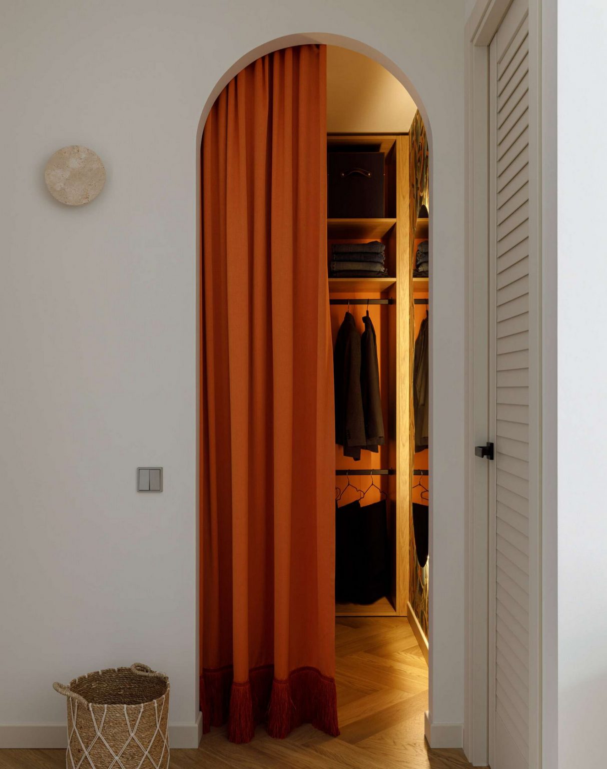 dressing room arched opening closed by orange curtain two-room apartment of 37m2 contemporary decoration