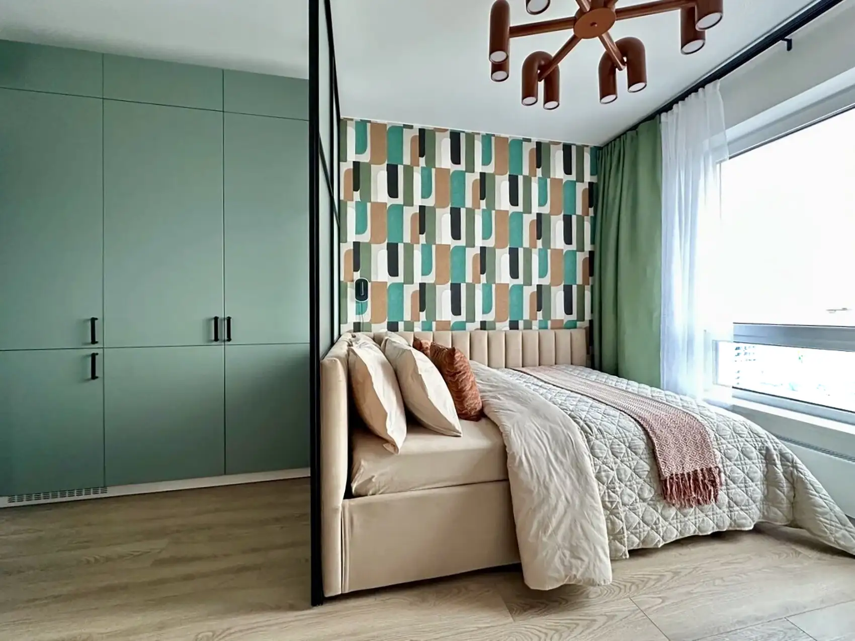 bedroom with glazed partition and wallpaper small flat