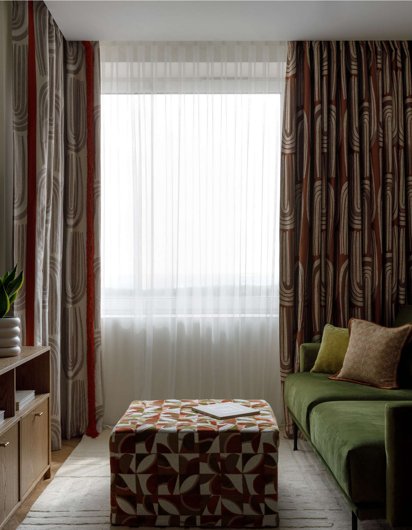 living room green velvet sofa contemporary decoration two-room apartment of 37m2