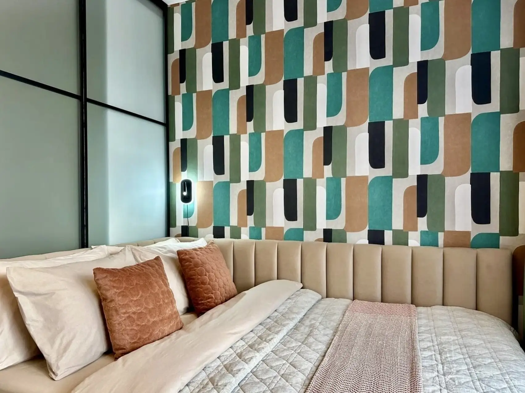 bedroom with glazed partition and wallpaper small flat