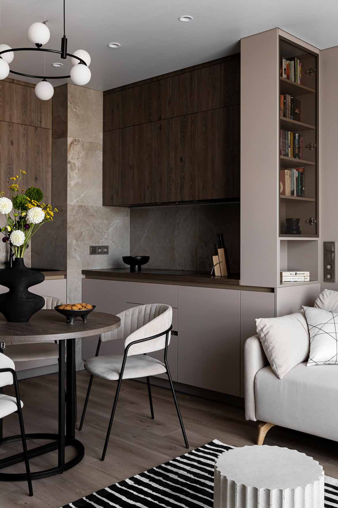 open kitchen and living room with white sofa and black and white rug, 60m2 neutral flat open kitchen and living room with white sofa and black and white rug, 60m2 neutral flat