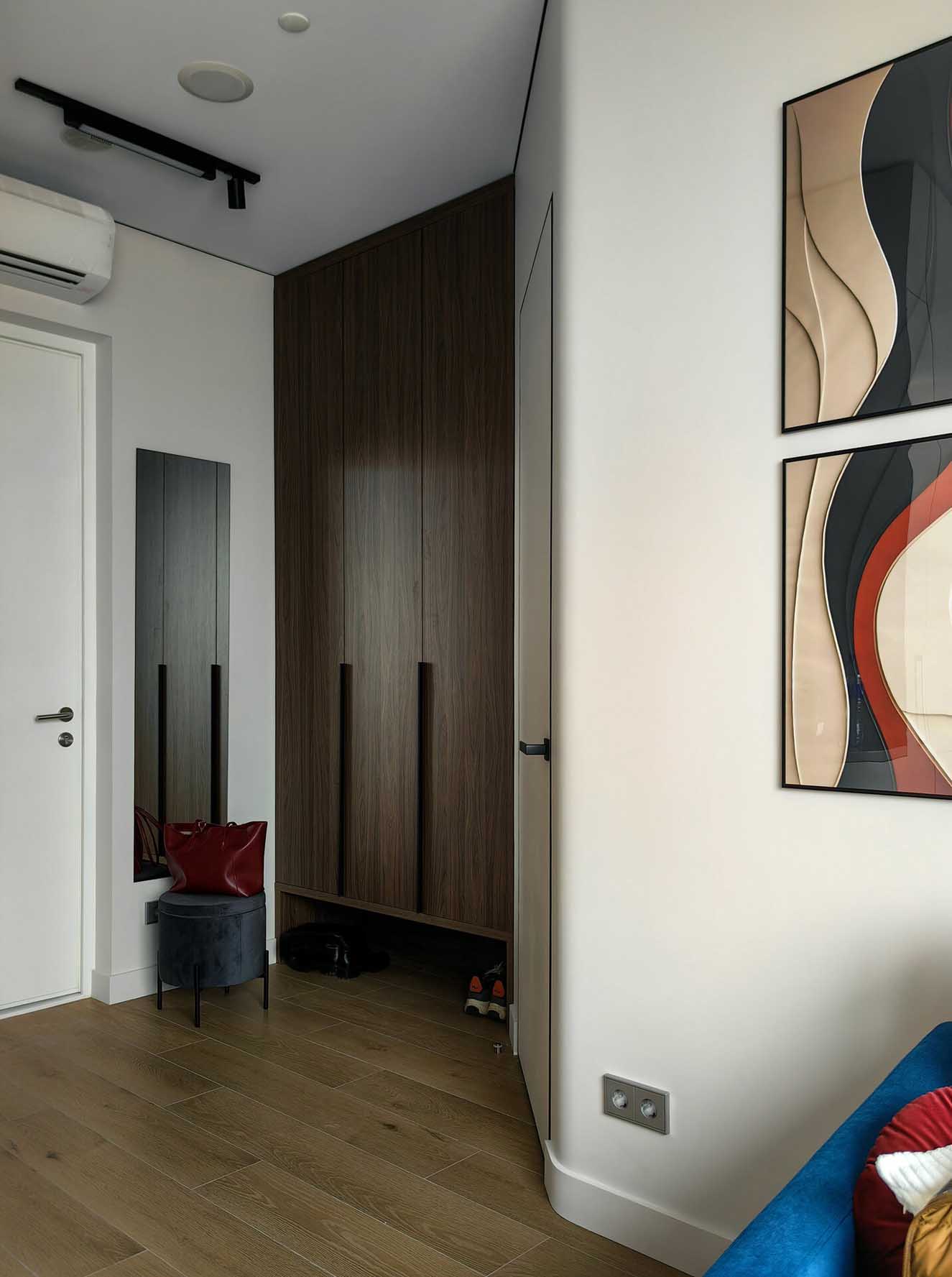 contemporary entryway with walnut cupboards contemporary entryway with walnut cupboards