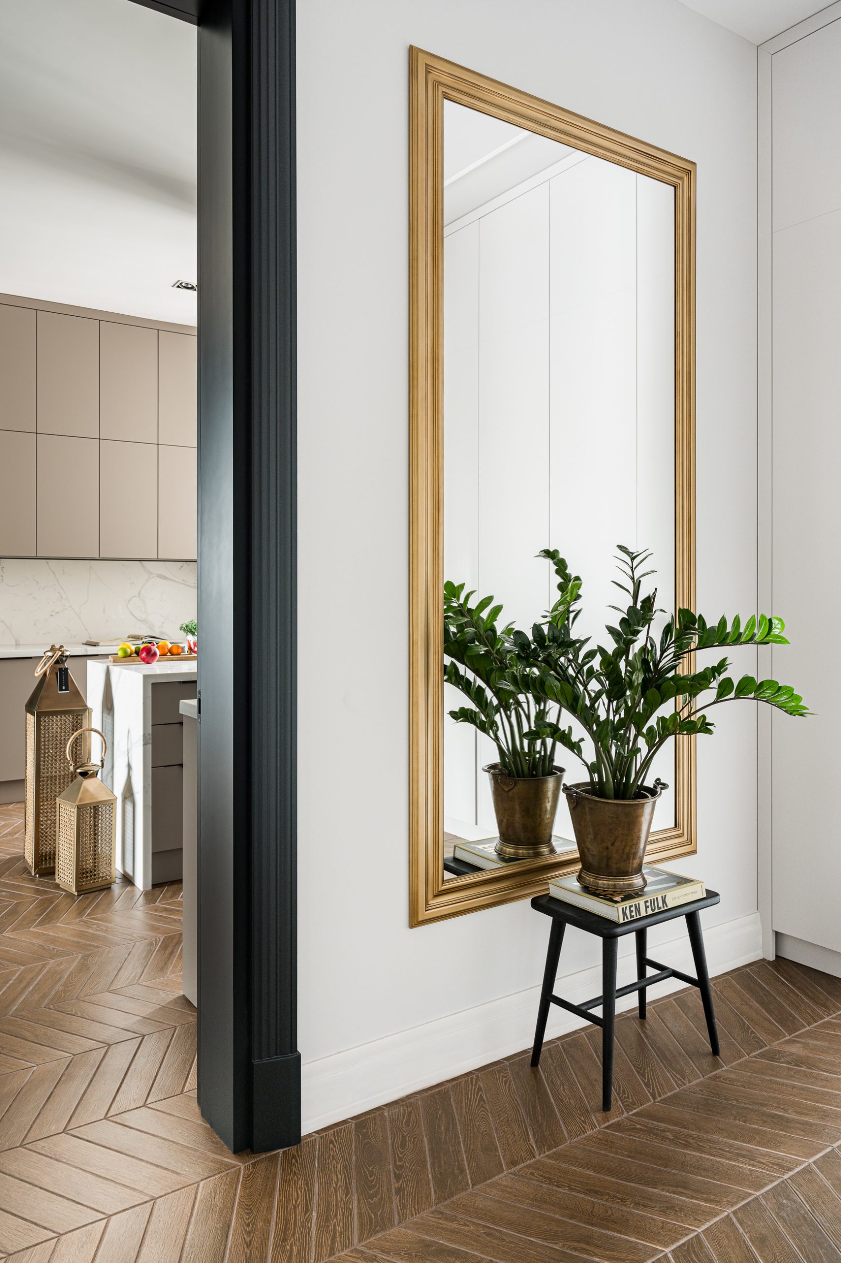 entryway with mirror and wooden floor