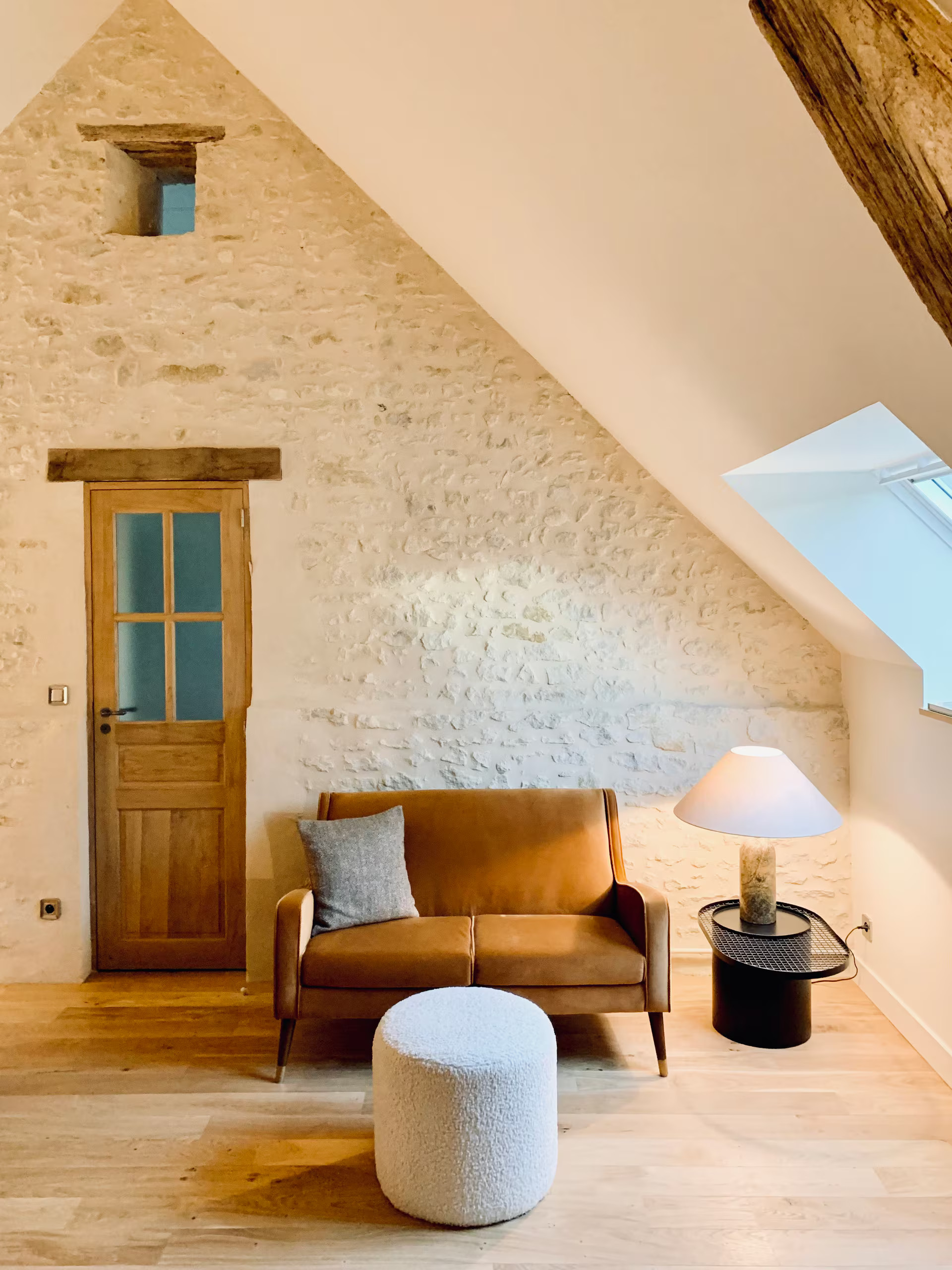 attic living room with beams rustic chic decor countryside France La Clef des Champs