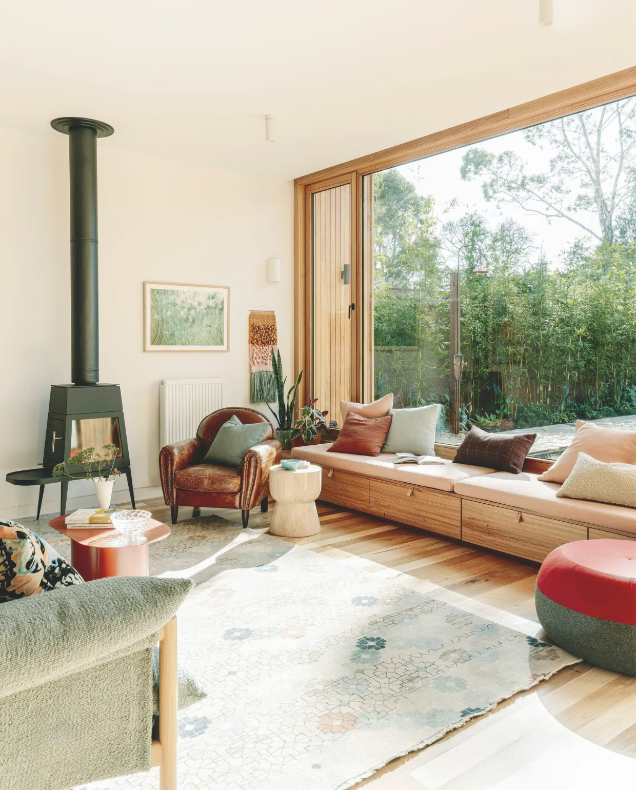 Contemporary decor in the living room with picture window, sustainable home in Melbourne Contemporary decor in the living room with picture window, sustainable home in Melbourne