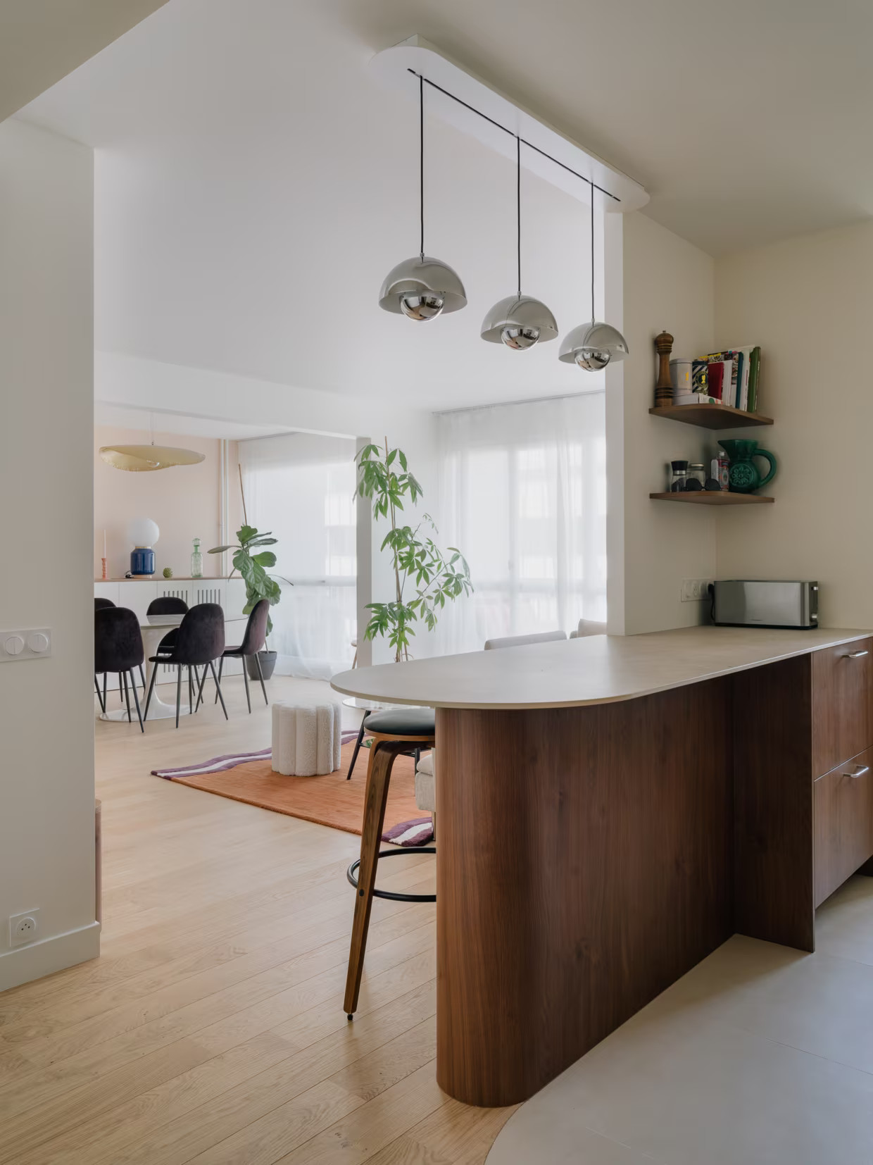 living room and open kitchen contemporary decoration apartment from the 70s in Paris