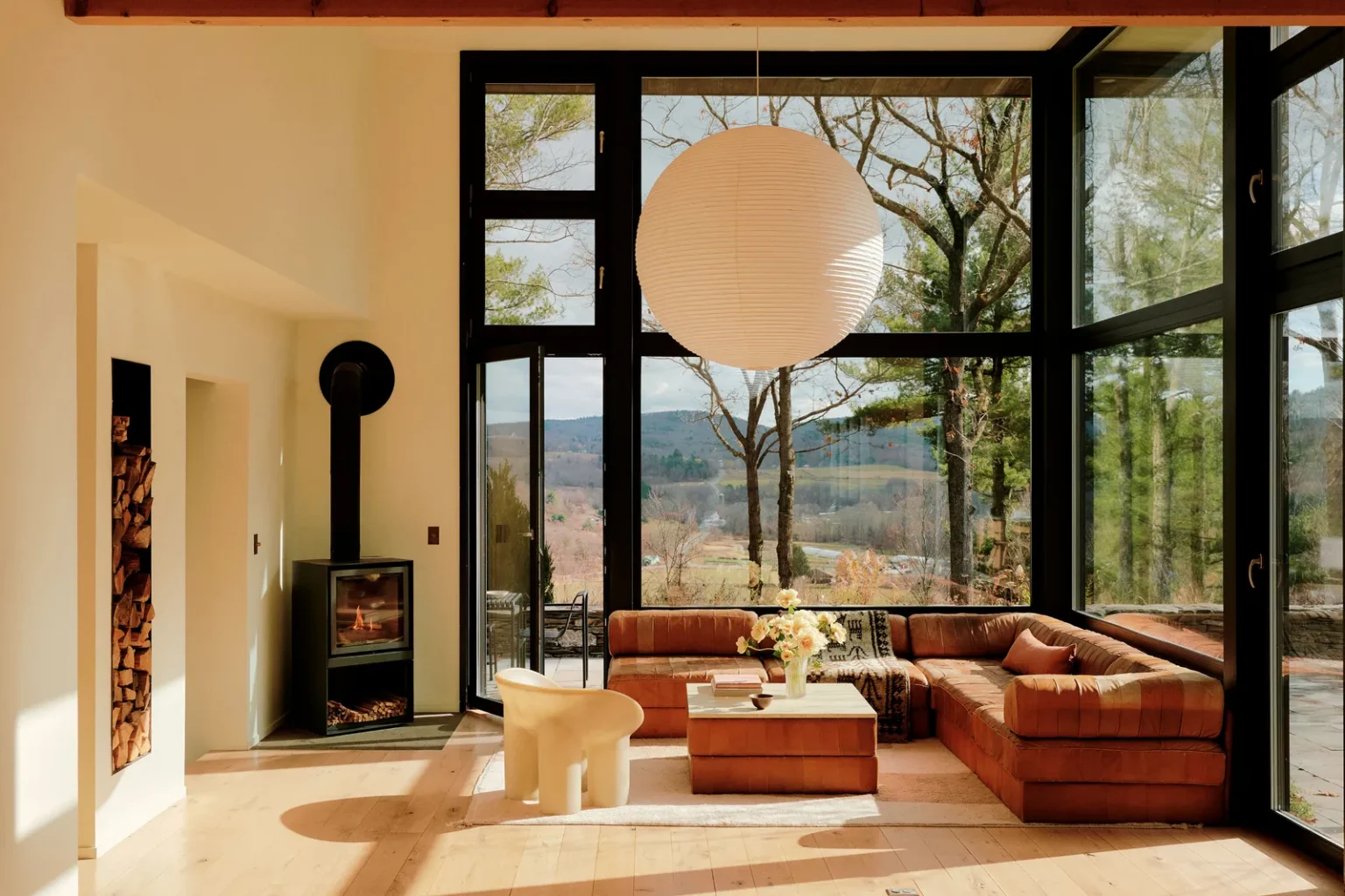 living room contemporary decoration with stove and bay windows wooden house Hudson Valley