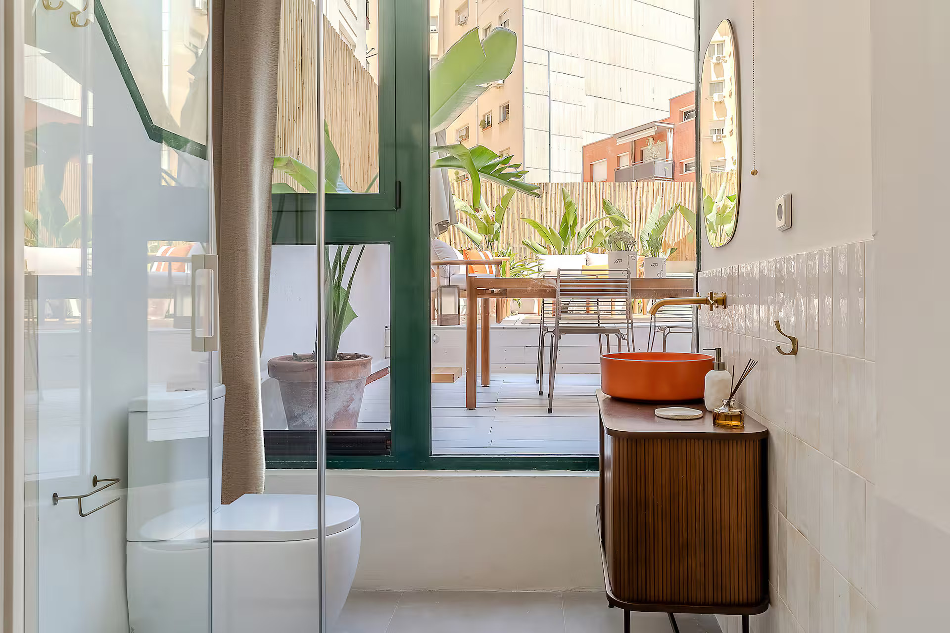 designer bathroom with orange sink