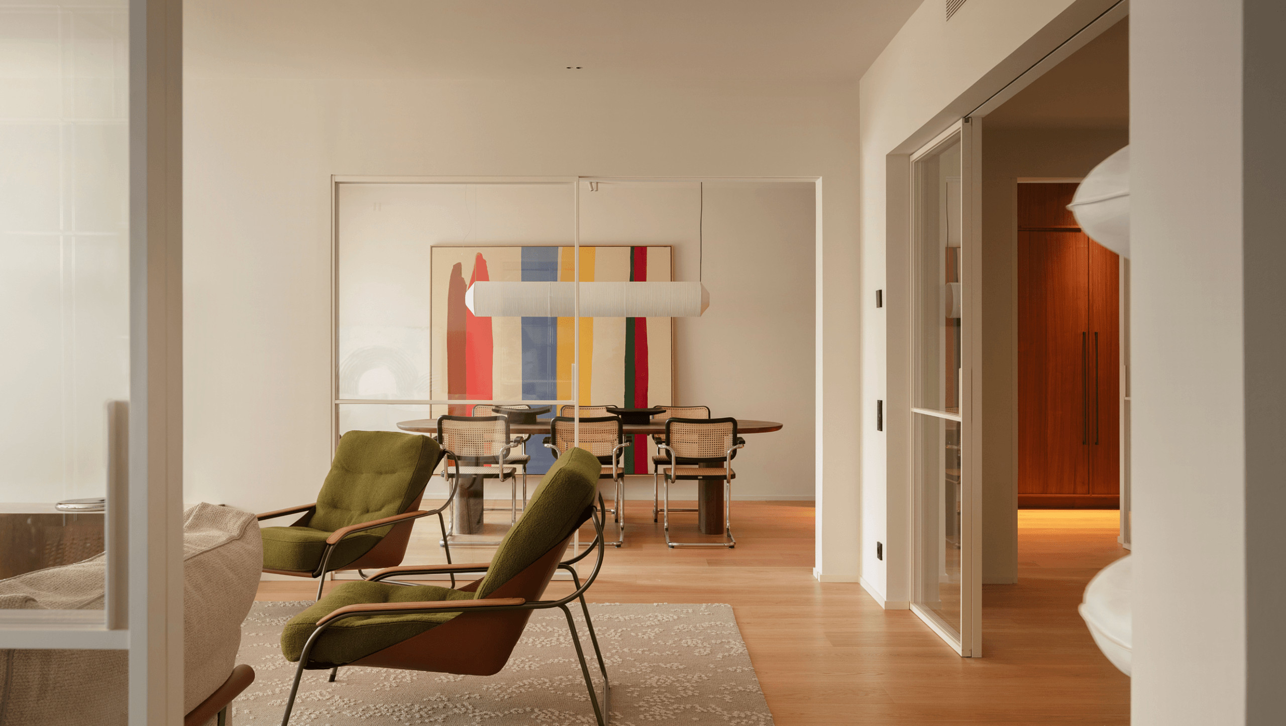 living room and dining room with black Cesca chairs contemporary decor apartment in Barcelona by The Room Studio living room and dining room with black Cesca chairs contemporary decor apartment in Barcelona by The Room Studio