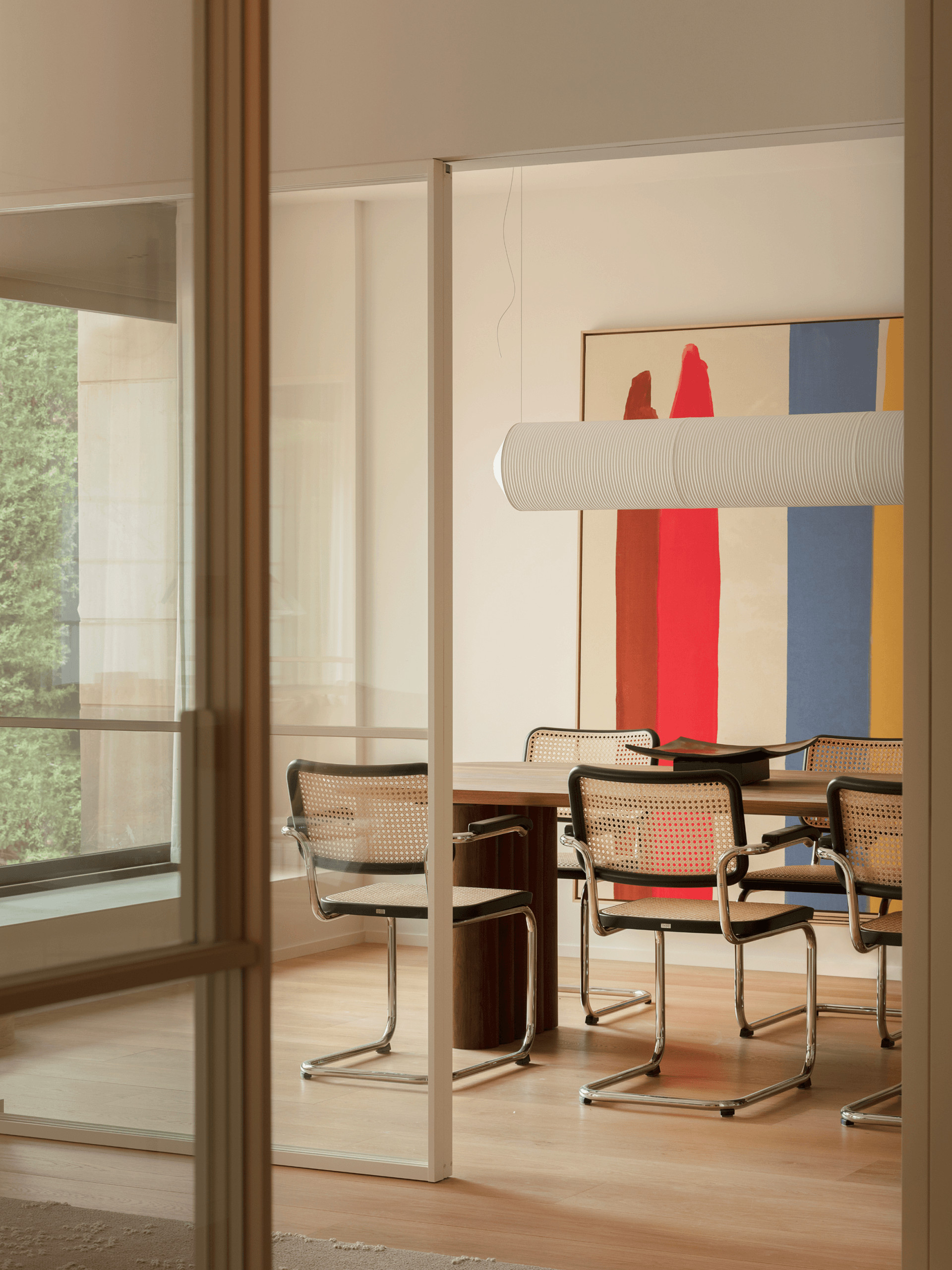 dining room with black Cesca chairs contemporary decor apartment in Barcelona by The Room Studio dining room with black Cesca chairs contemporary decor apartment in Barcelona by The Room Studio