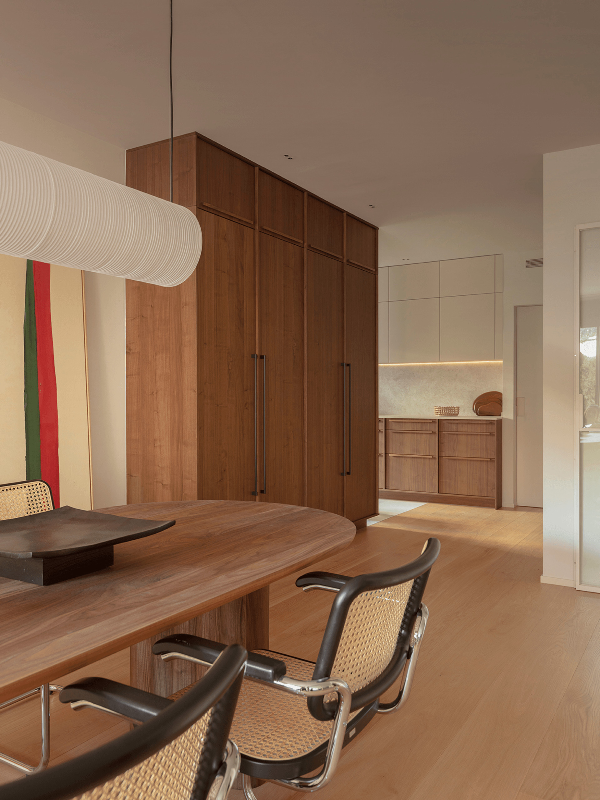 kitchen and dining room with black Cesca chairs contemporary decor apartment in Barcelona by The Room Studio kitchen and dining room with black Cesca chairs contemporary decor apartment in Barcelona by The Room Studio