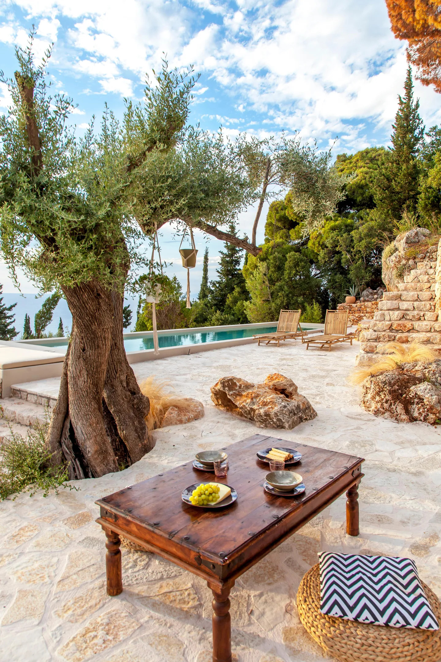 garden with olive tree facing the sea contemporary house Greece with pool Agios Nikitas