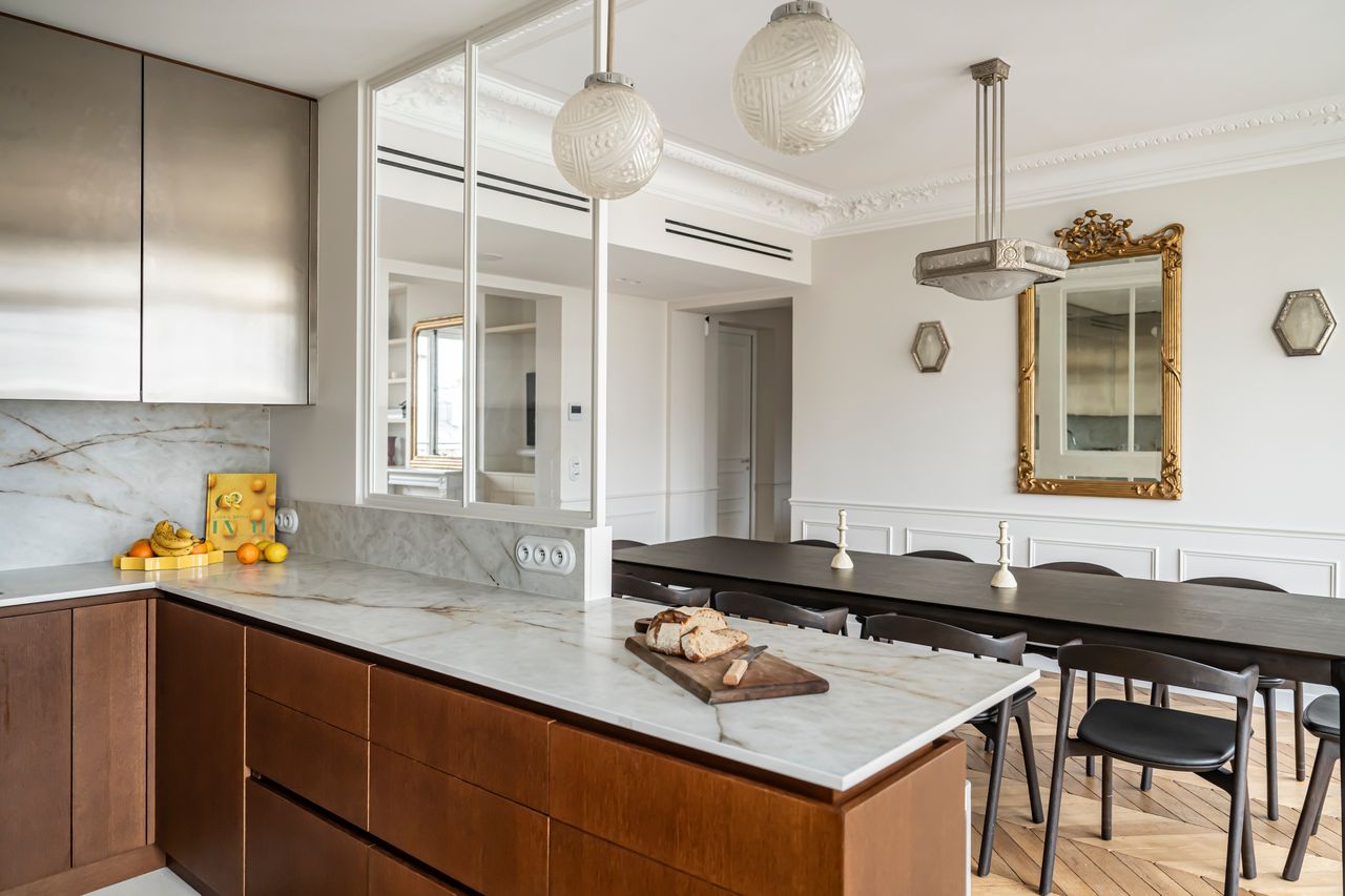 dining room and semi open kitchen contemporary decor Haussmann-style Parisian apartment photo ©Julien Pepy
