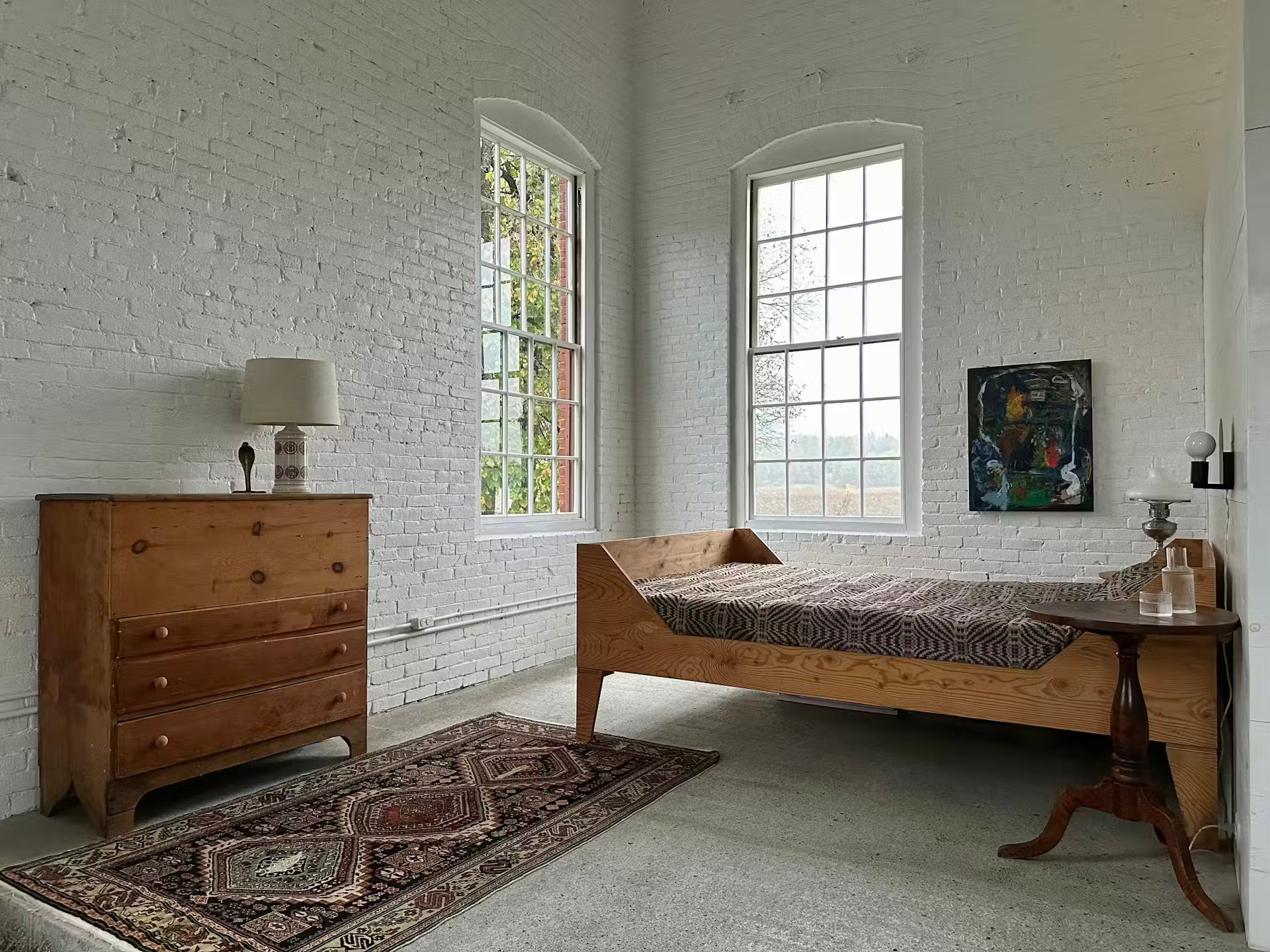 bedroom with white bricks walls minimalist decor in a renovated historic home bedroom with white bricks walls minimalist decor in a renovated historic home
