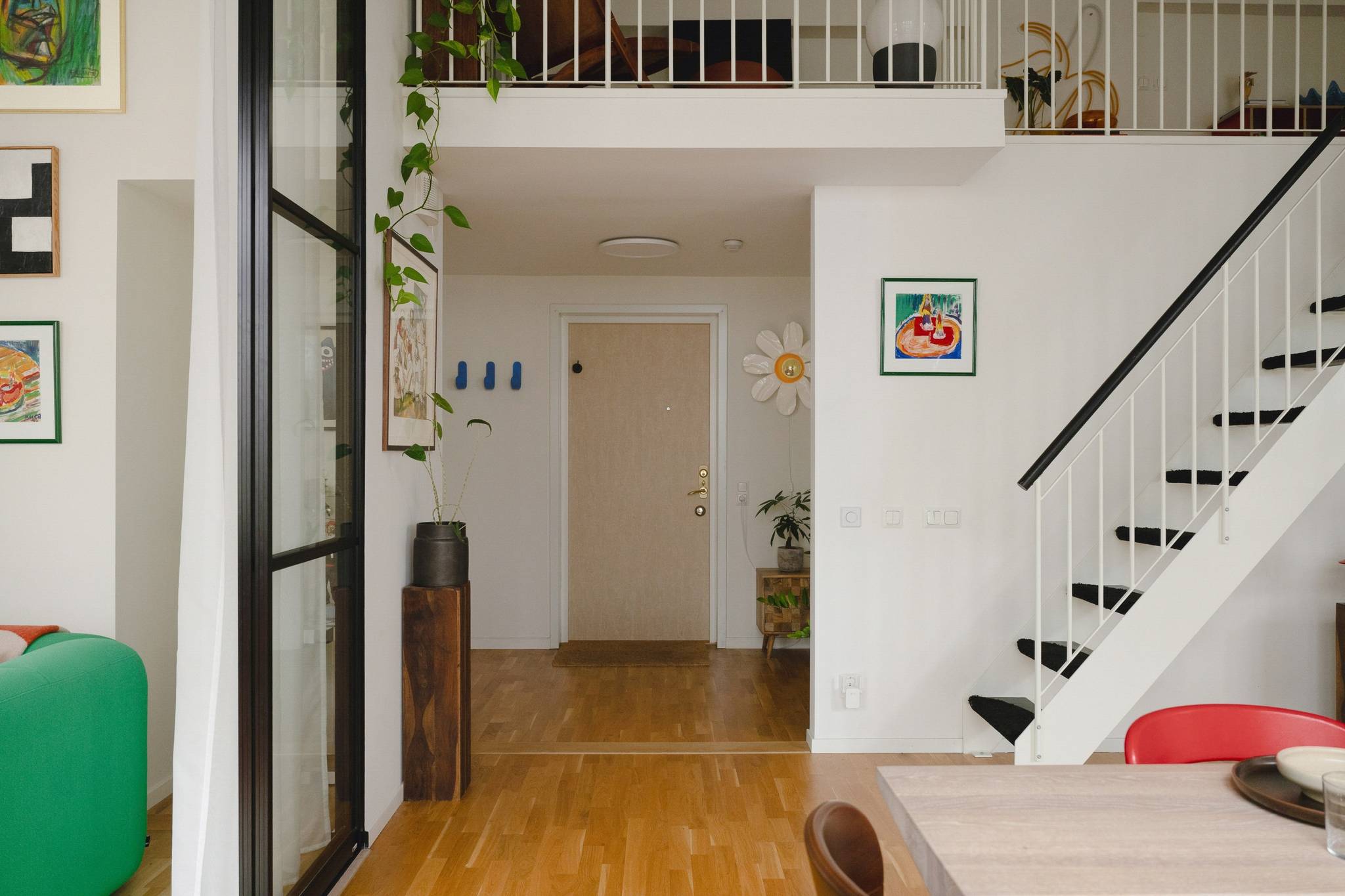 living room with stairs and mezzanine living room with stairs and mezzanine