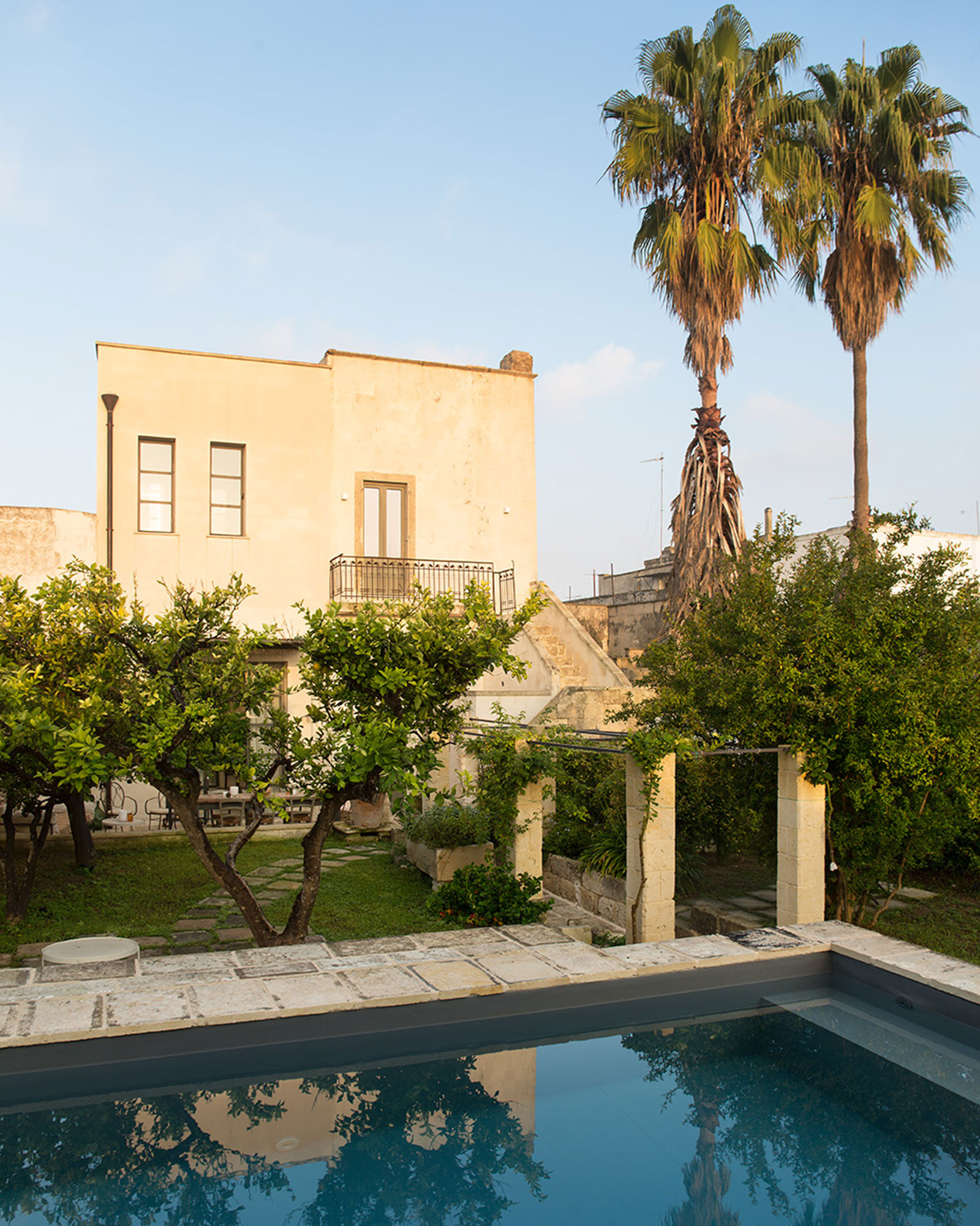 pool in the garden of a renovated historic townhouse in Puglia