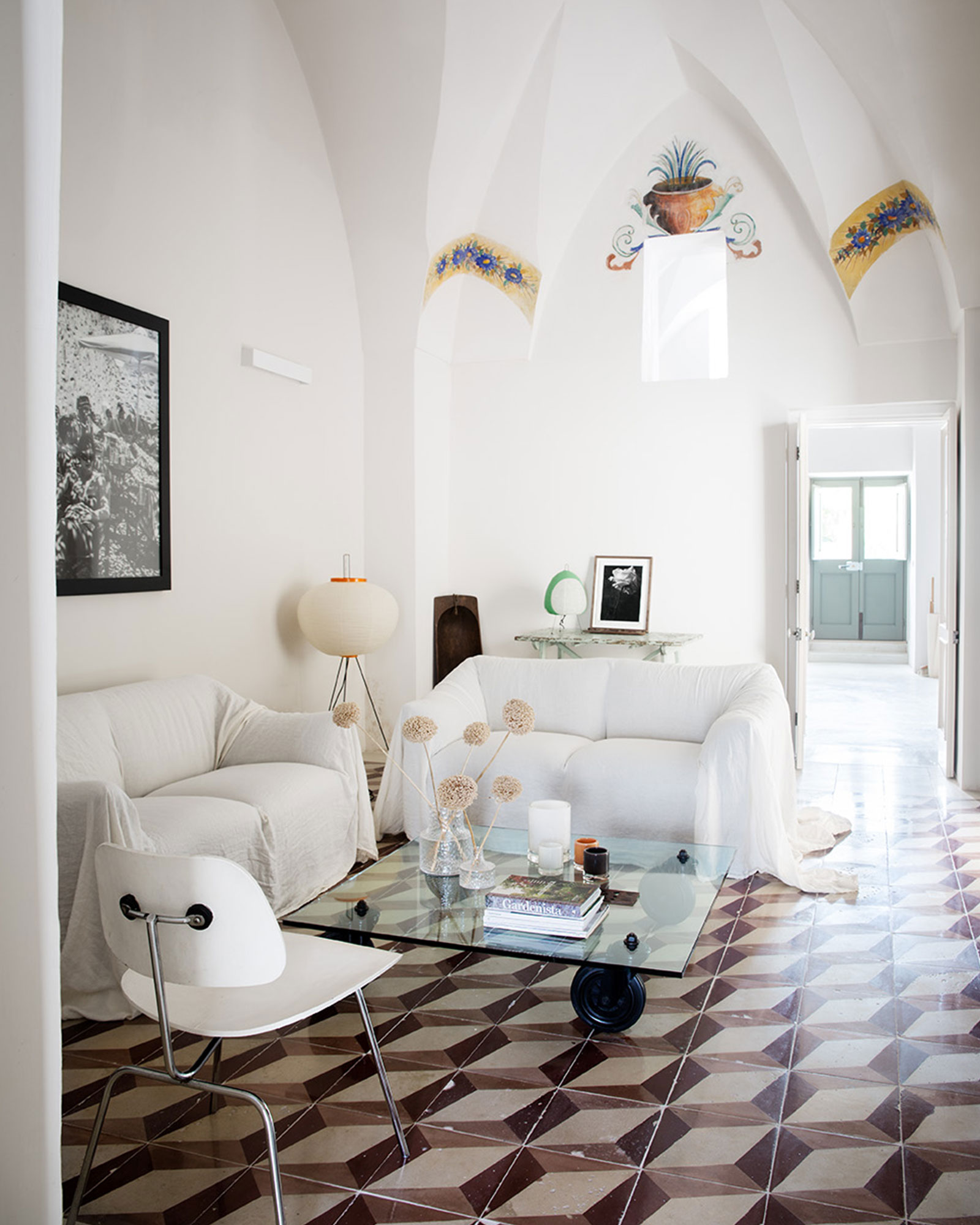 white living room with arches renovated historic townhouse in Puglia modern decor