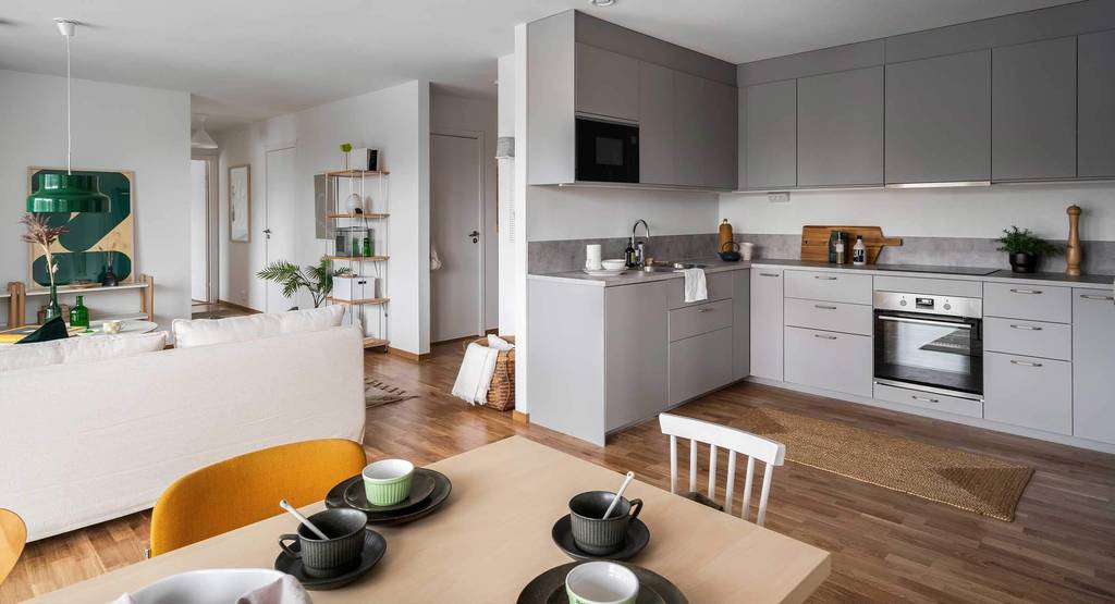 open kitchen dining room and living room 87sqm apartment scandinavian decor with yellow and green accents