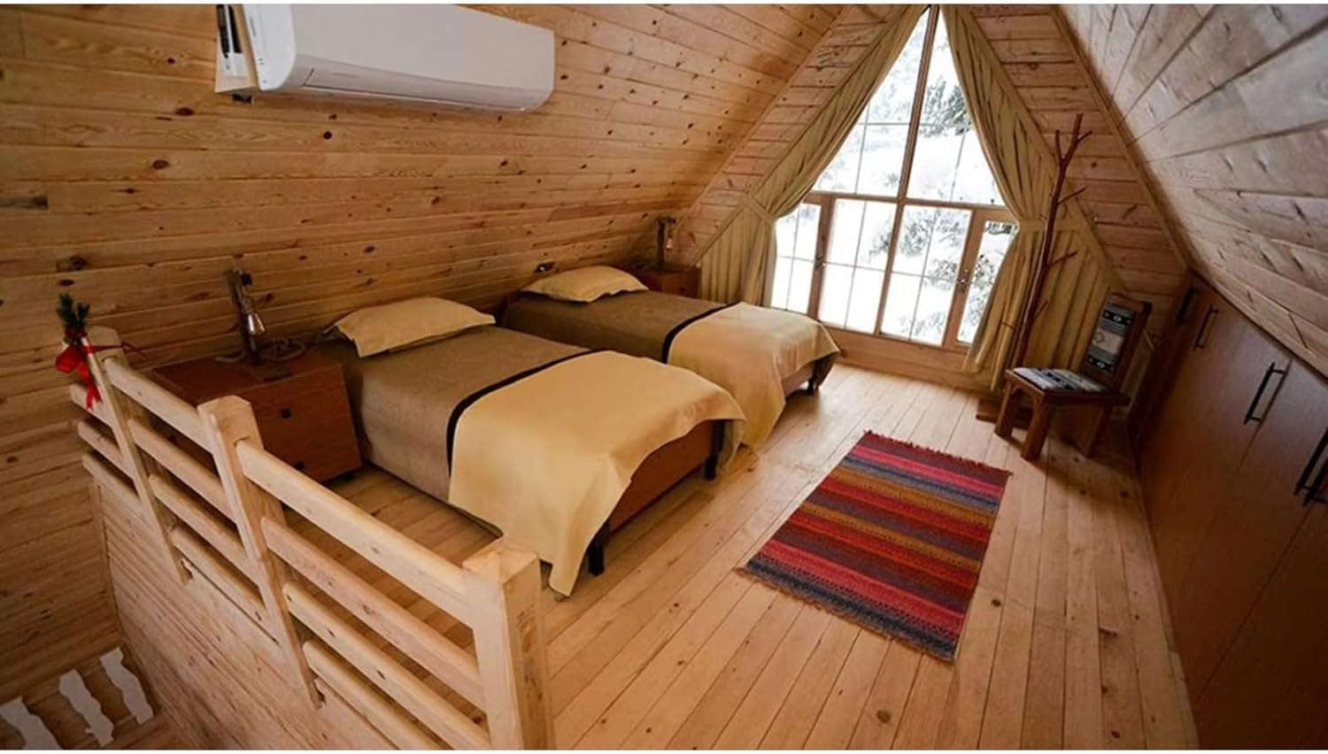 attic bedroom with two beds