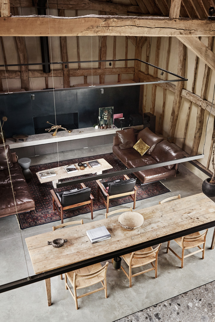 dining room and living room with beams contemporary decor former English barn renovated