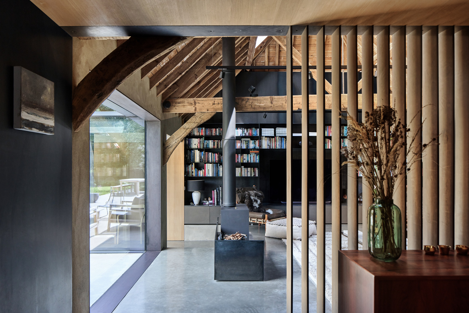living room with beams and stove contemporary decor former English barn renovated