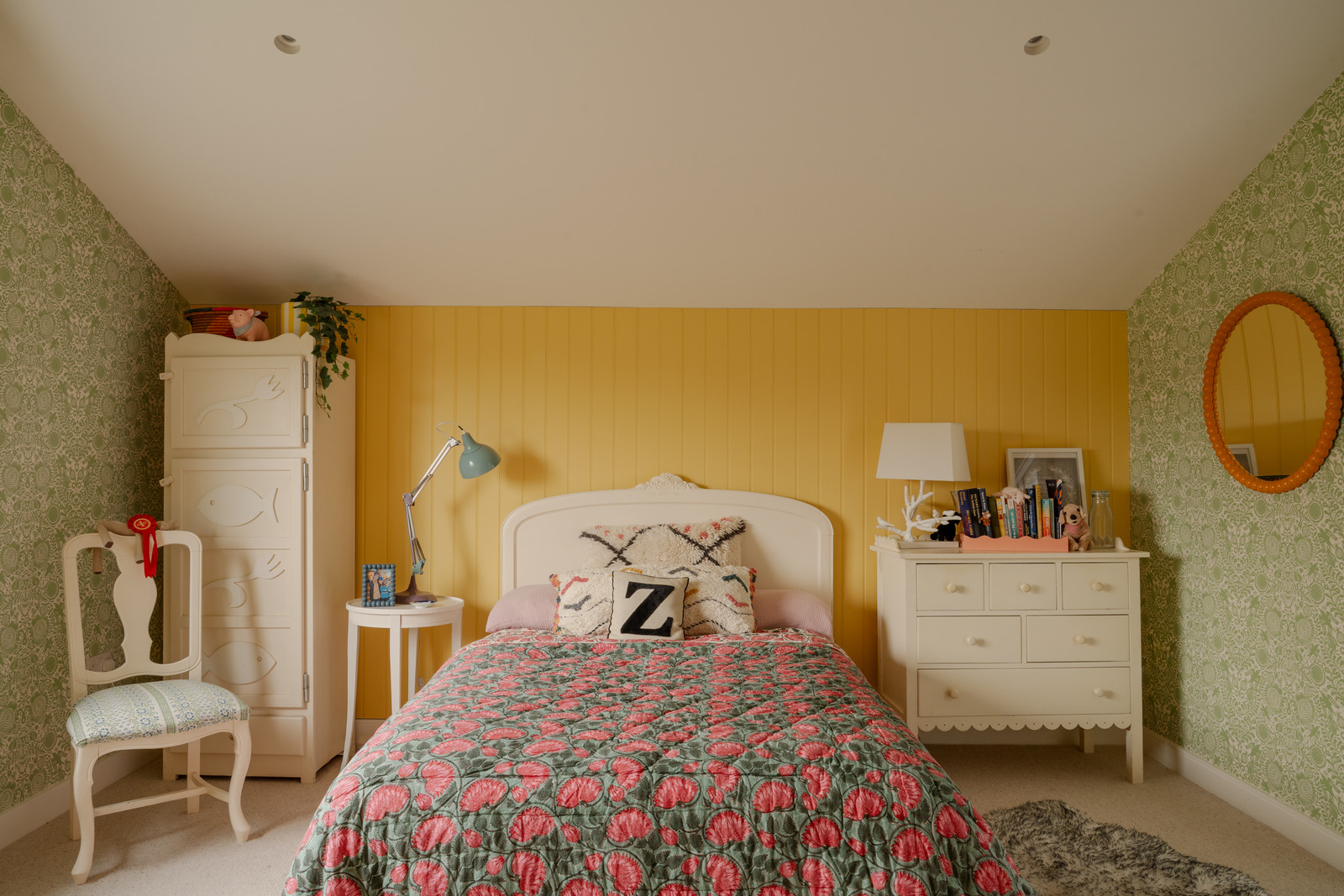 country chic style bedroom with floral wallpaper and yellow wall