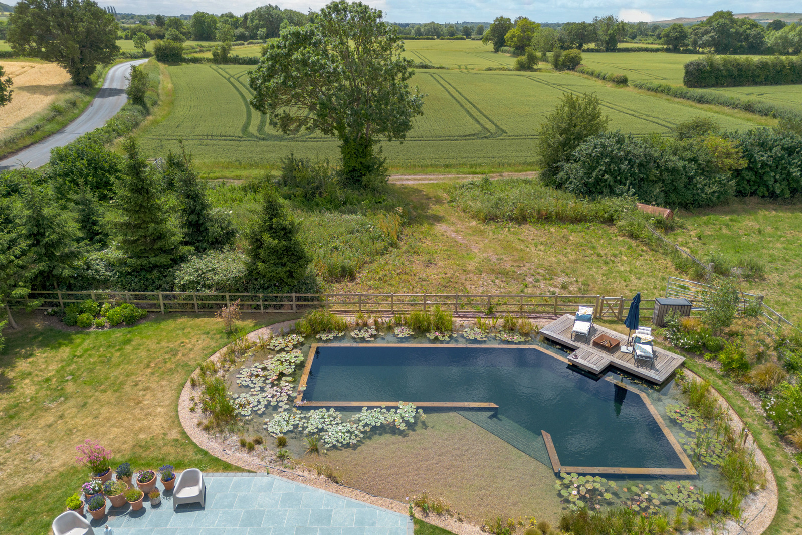 converted barn with natural ecological pool
