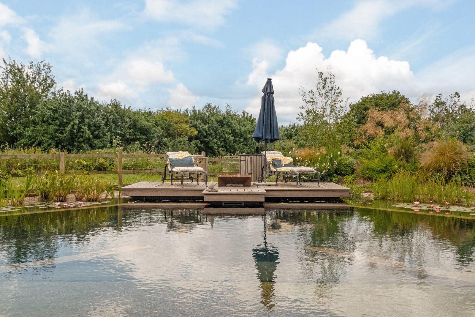 converted barn with natural ecological pool