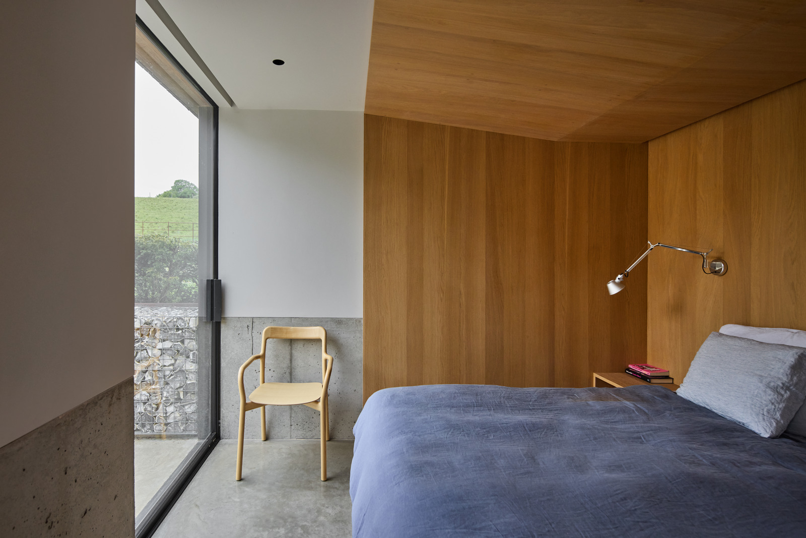 modern bedroom minimalist style with wooden walls and bay window