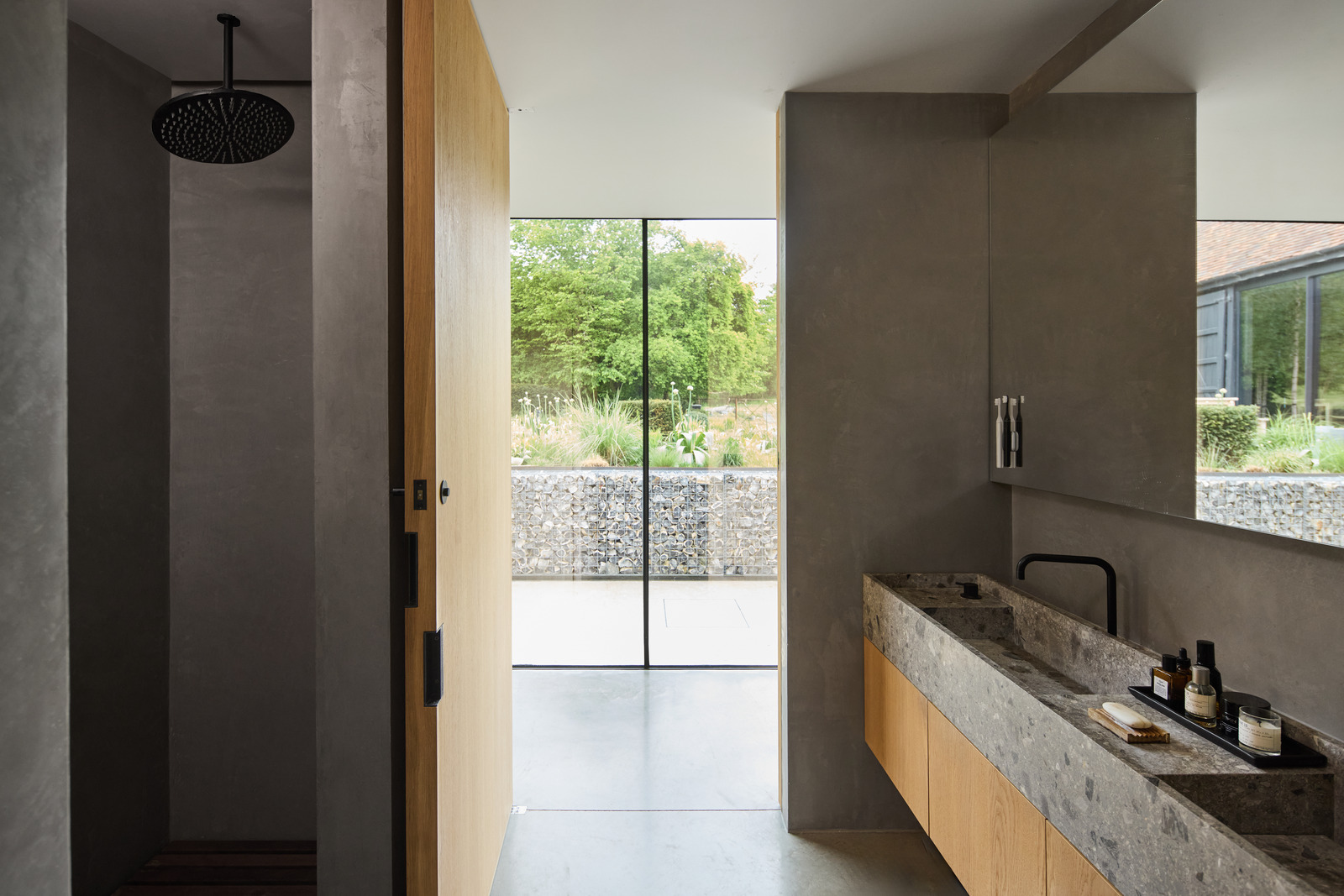 designer bathroom gray and wood with bay window